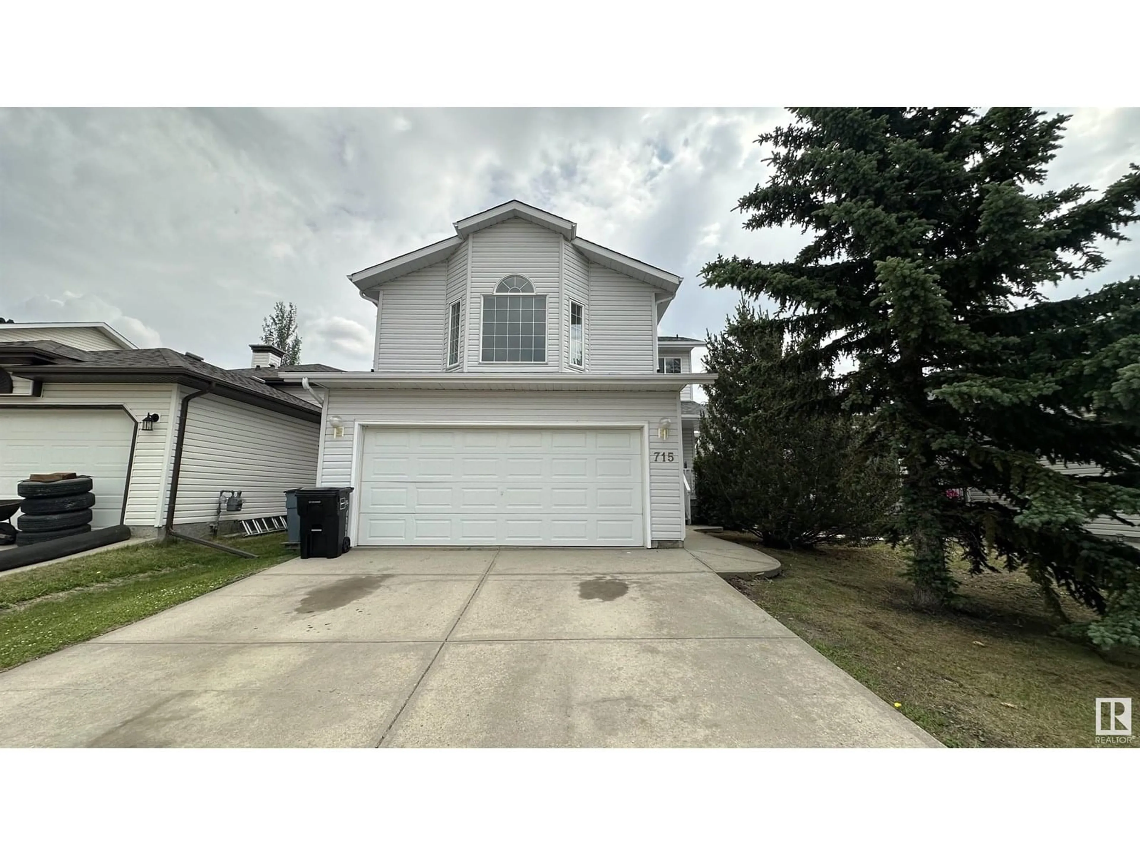 Home with vinyl exterior material, street for 715 BALFOUR CL, Edmonton Alberta T5T6H7
