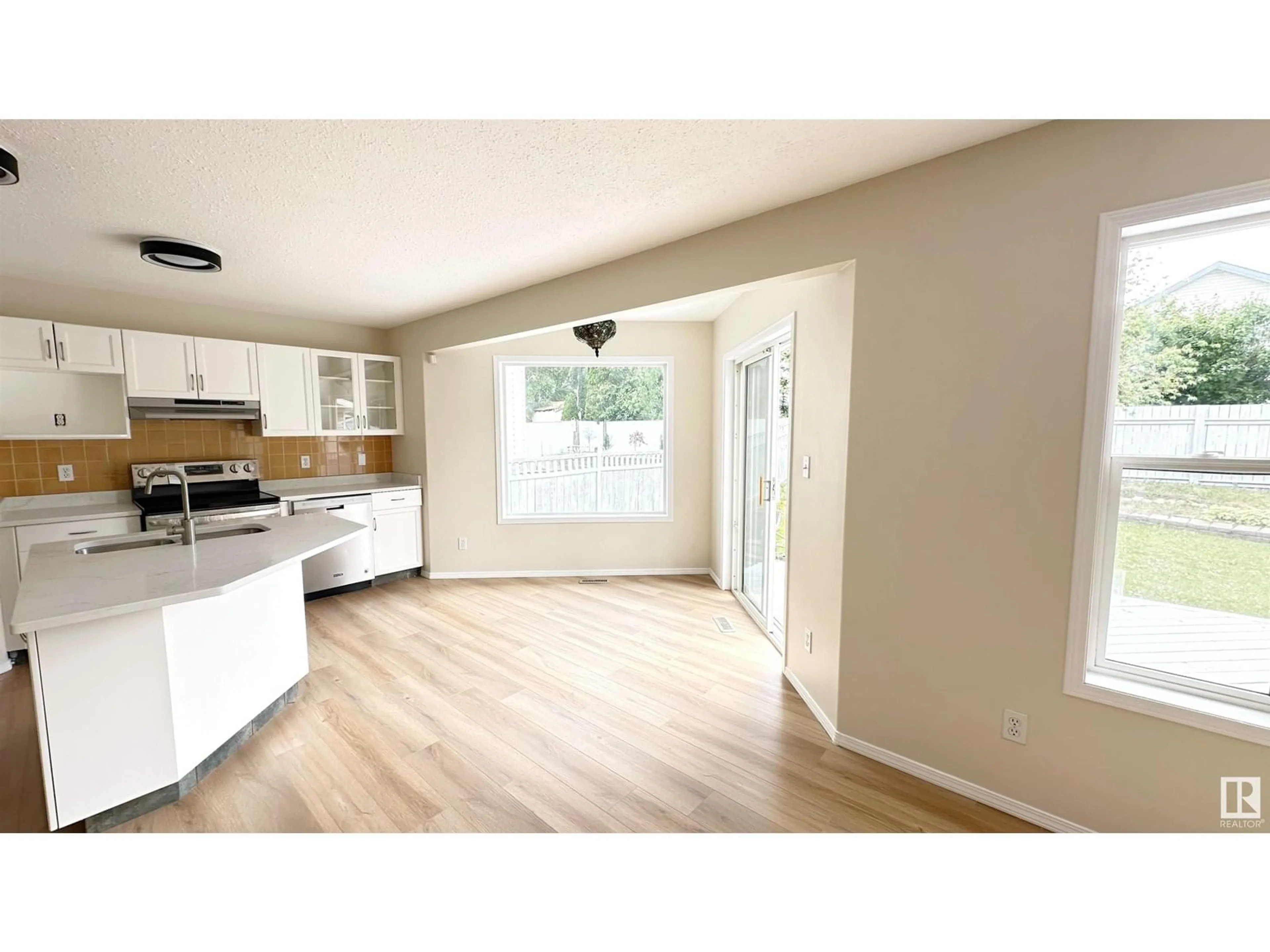 Open concept kitchen, wood/laminate floor for 715 BALFOUR CL, Edmonton Alberta T5T6H7