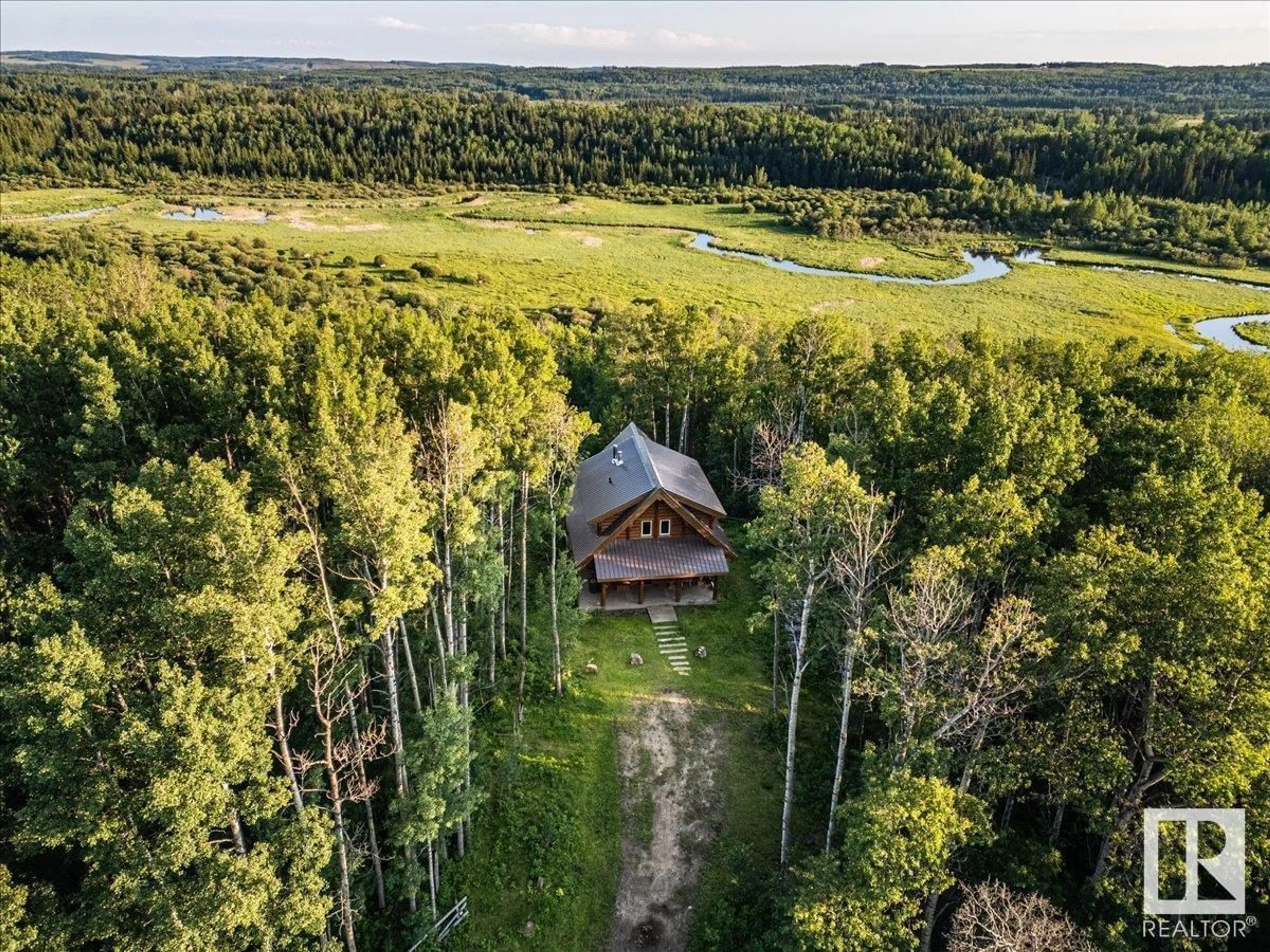 A pic from outside/outdoor area/front of a property/back of a property/a pic from drone, forest/trees view for 453039 RGE ROAD 10, Rural Wetaskiwin County Alberta T0C2V0