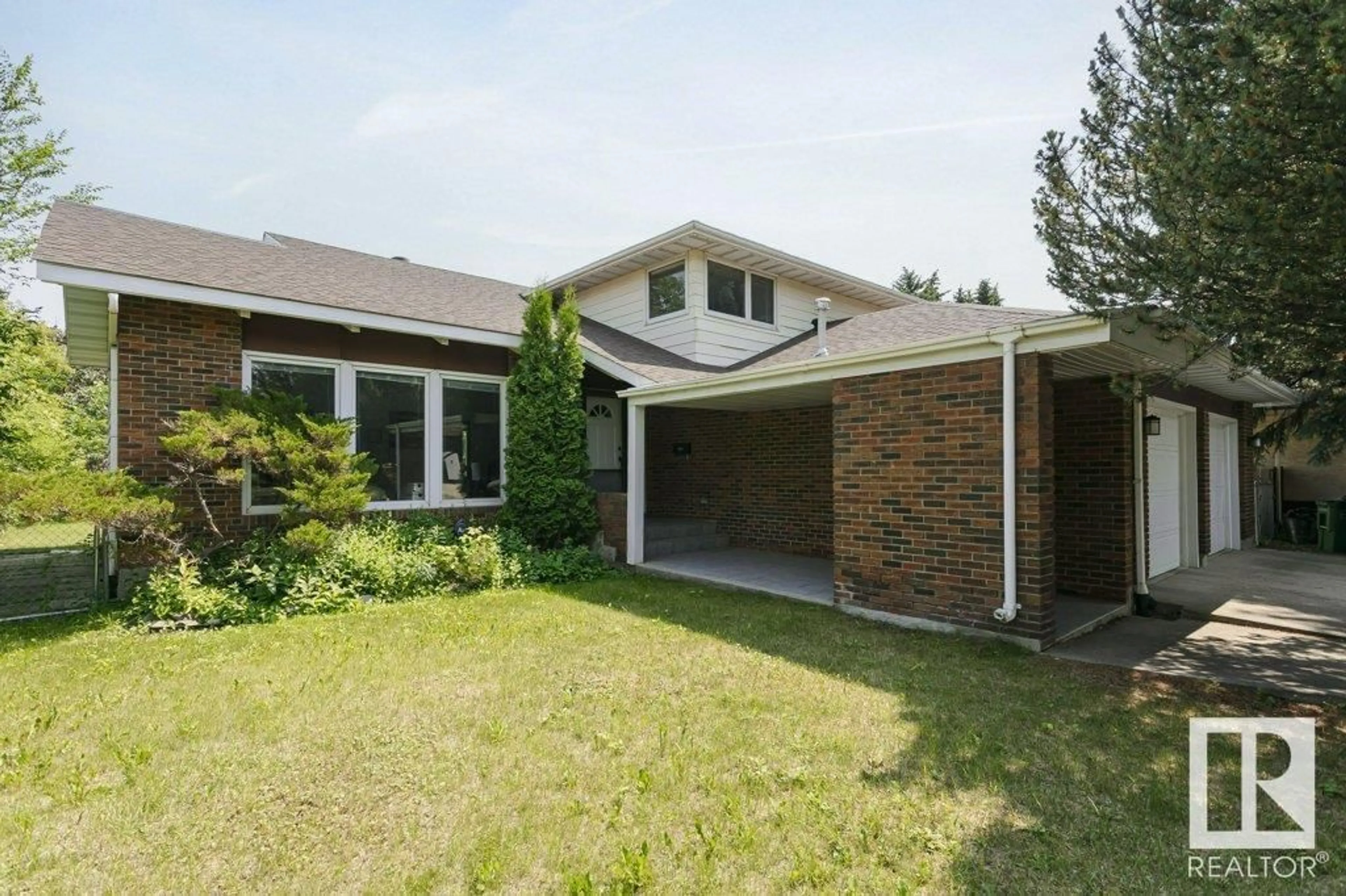 Home with brick exterior material, street for NW - 6327 145A ST, Edmonton Alberta T6H4J1