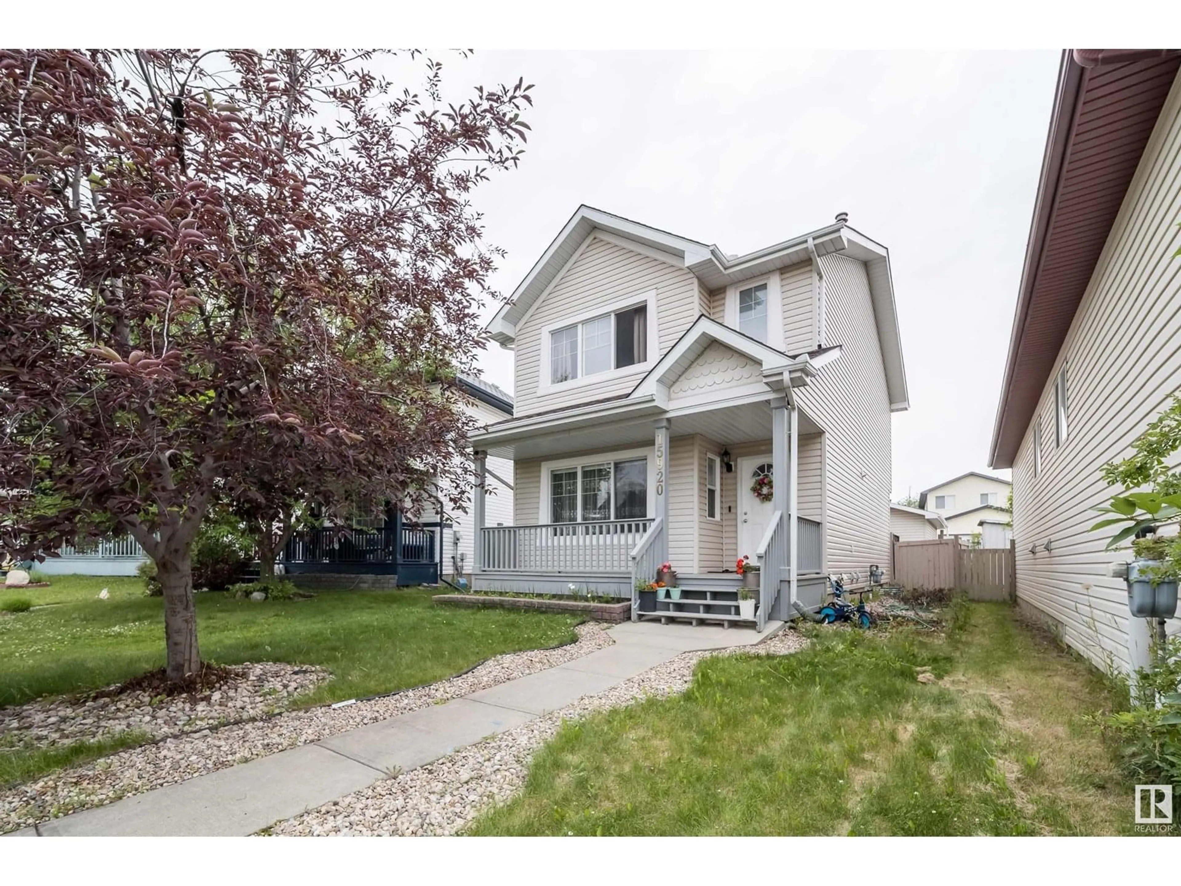 Home with vinyl exterior material, street for NW - 15920 38 ST, Edmonton Alberta T5Y3E9