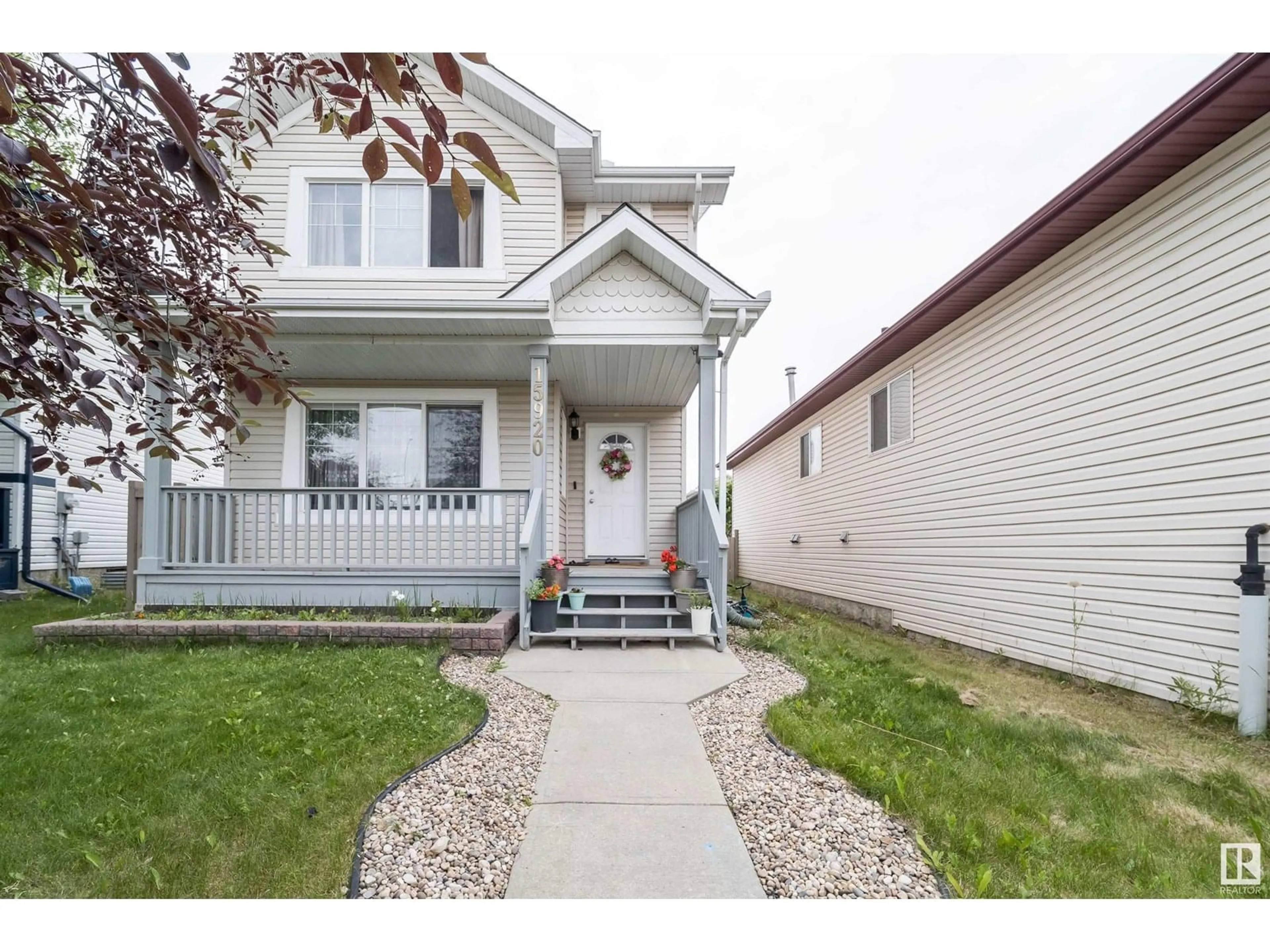 Home with vinyl exterior material, street for NW - 15920 38 ST, Edmonton Alberta T5Y3E9