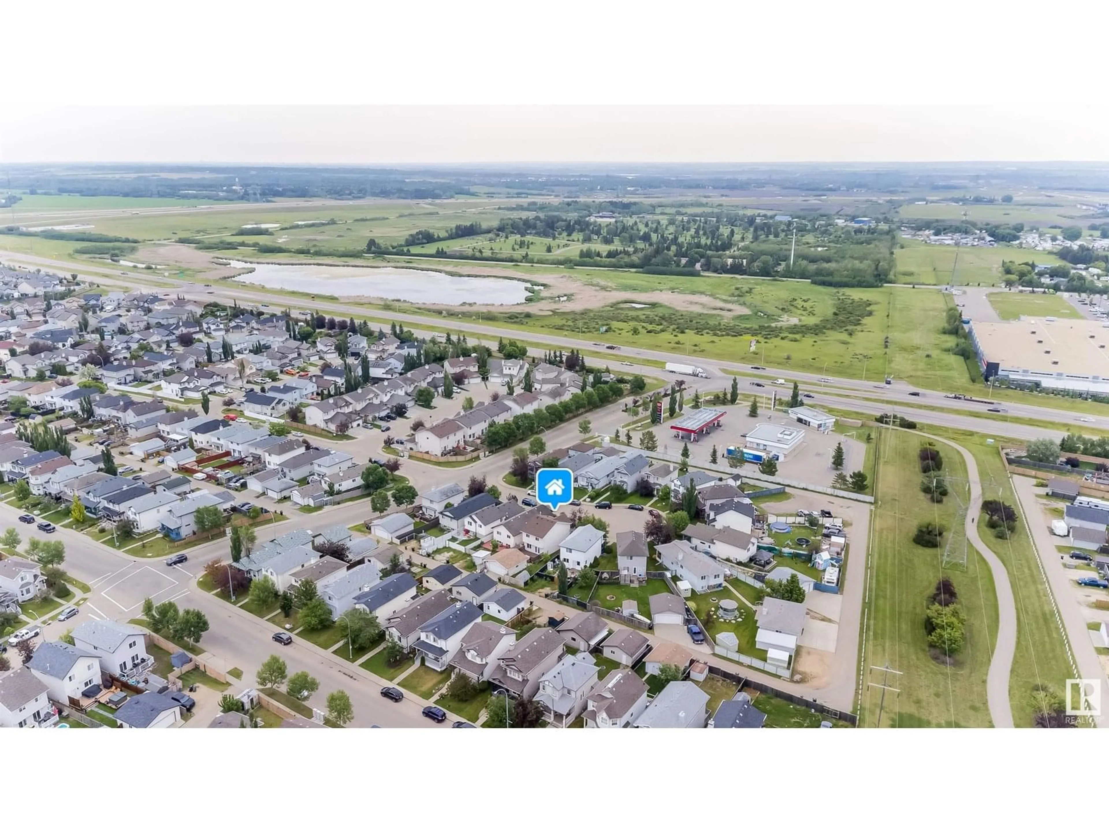 A pic from outside/outdoor area/front of a property/back of a property/a pic from drone, unknown for NW - 15920 38 ST, Edmonton Alberta T5Y3E9