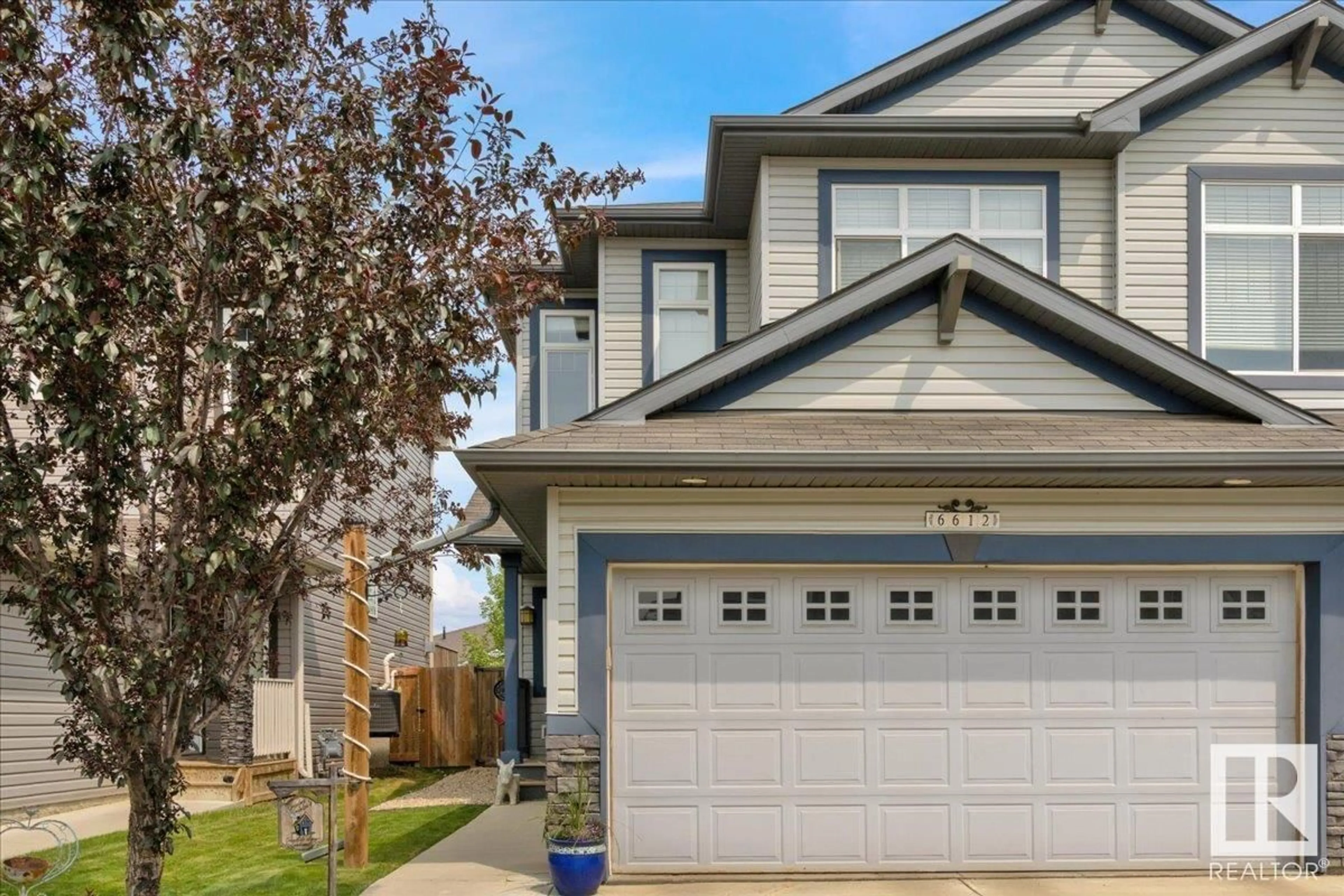 Home with vinyl exterior material, street for 6612 48 AV, Beaumont Alberta T4X1Y5