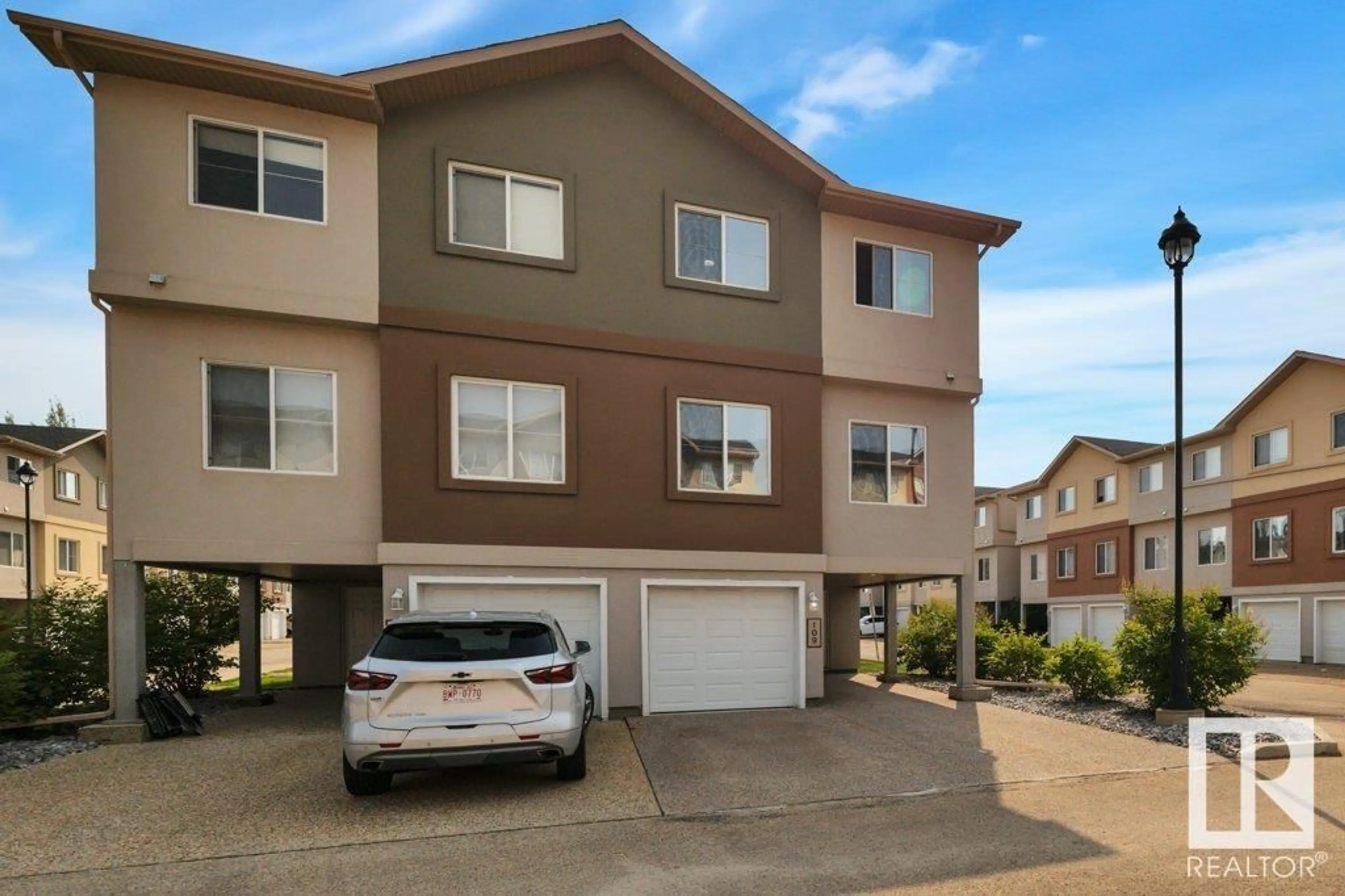 A pic from outside/outdoor area/front of a property/back of a property/a pic from drone, street for #109 - 104 WEST HAVEN DR, Leduc Alberta T9E0N9