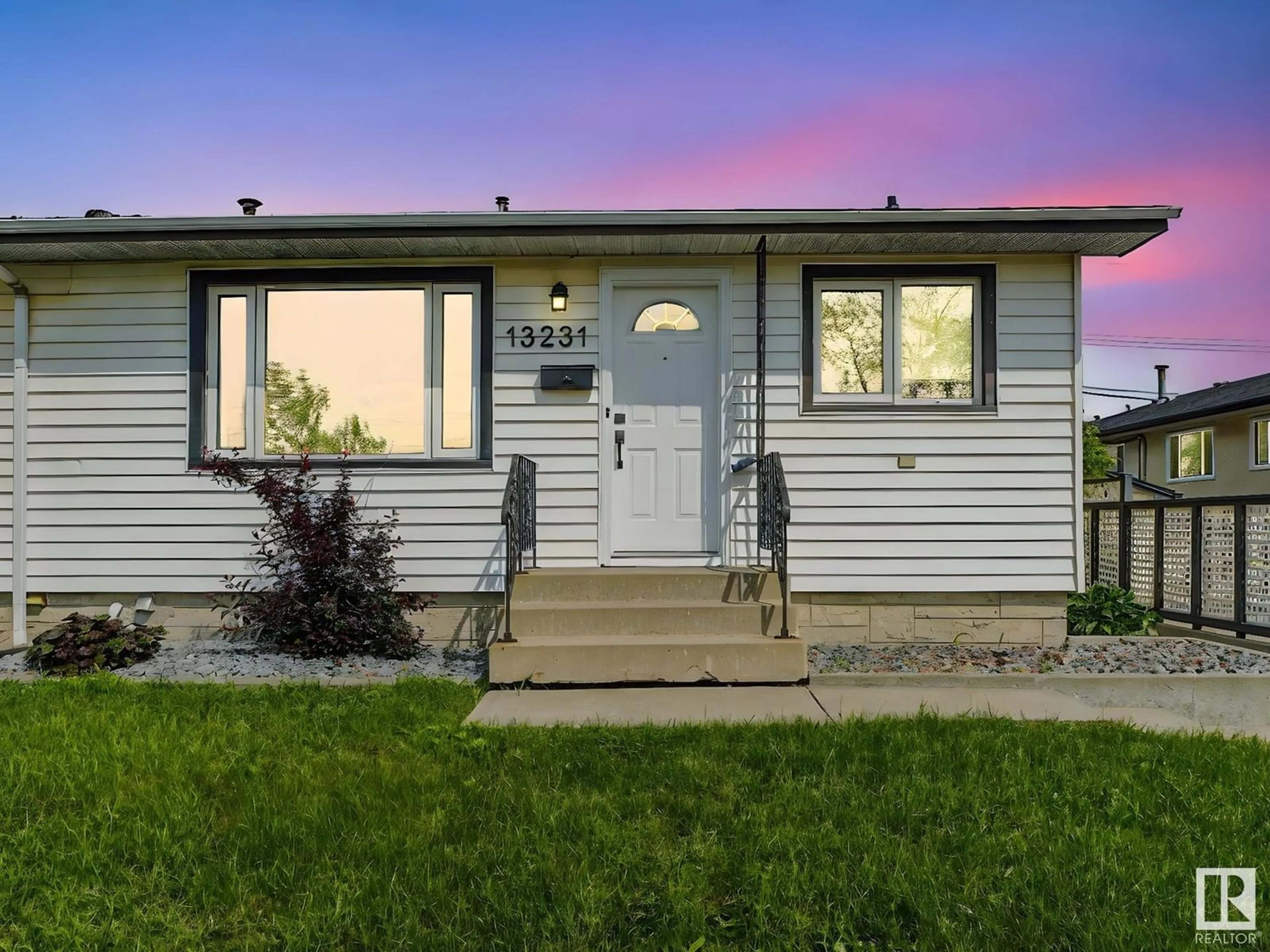 Home with vinyl exterior material, street for NW - 13231 82 ST, Edmonton Alberta T5E2T9