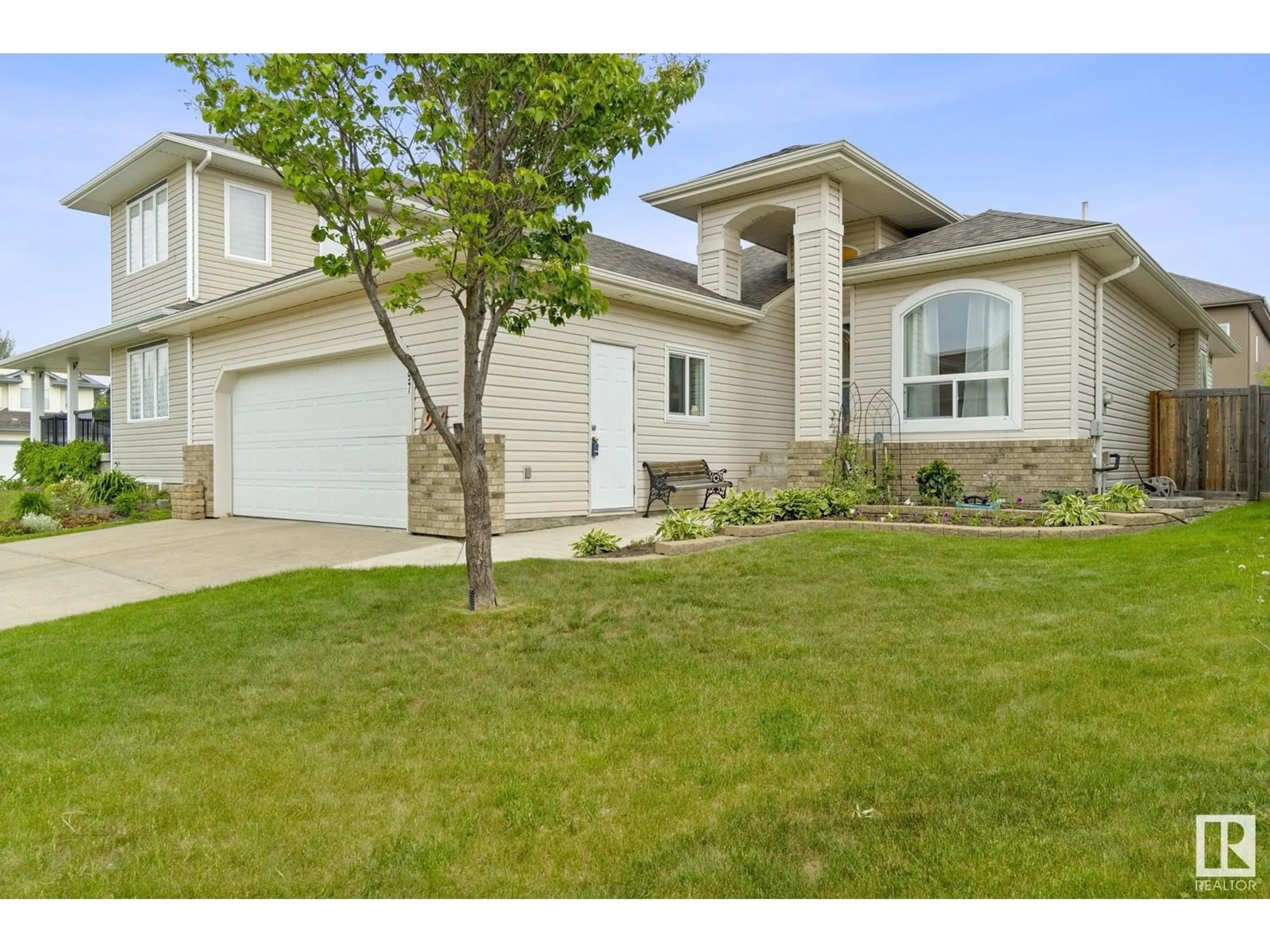 Home with vinyl exterior material, street for 97 LAKEWOOD BV, Beaumont Alberta T4X1T3