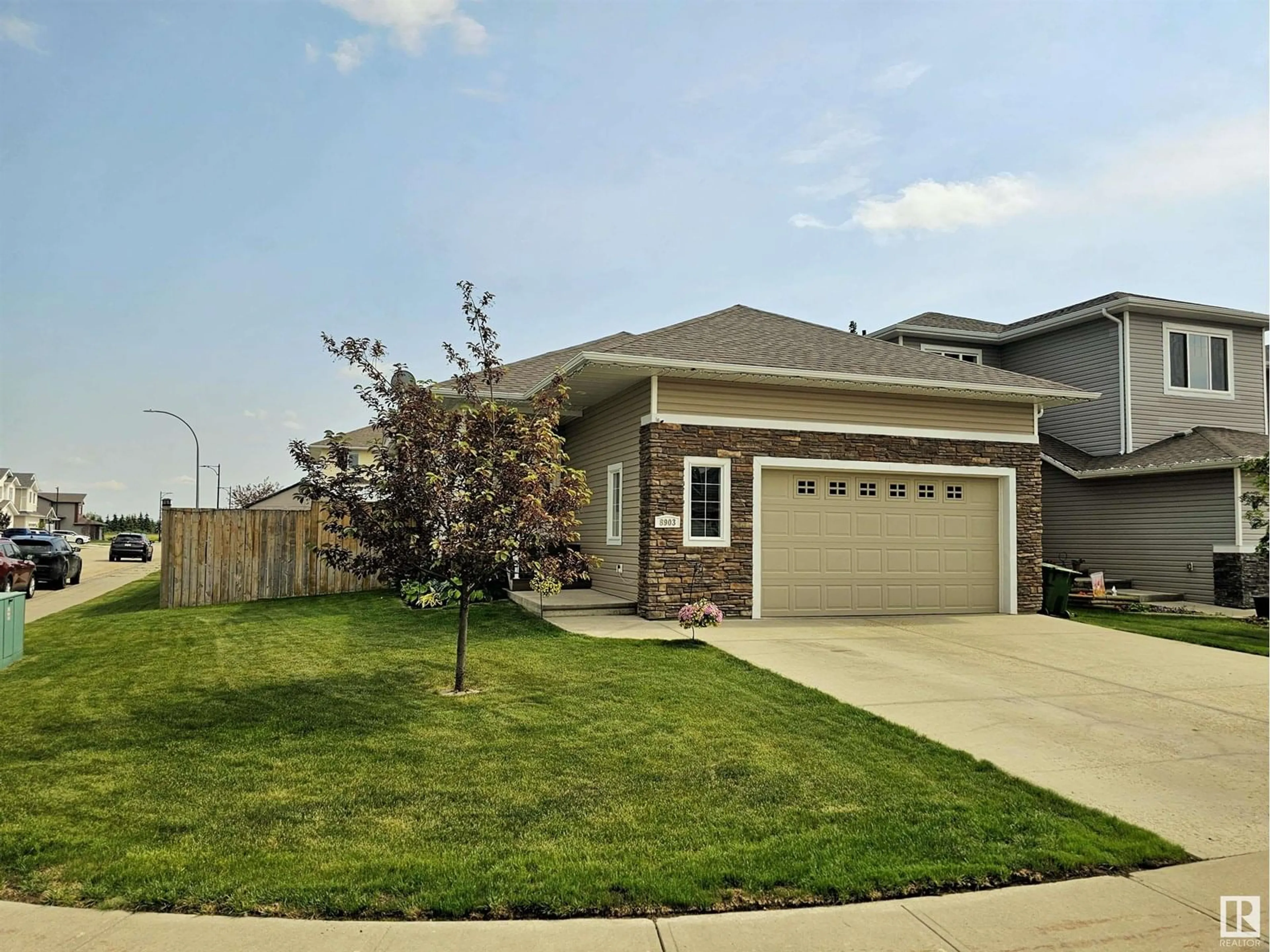 Home with vinyl exterior material, street for 8903 97A AV, Morinville Alberta T8R2N6
