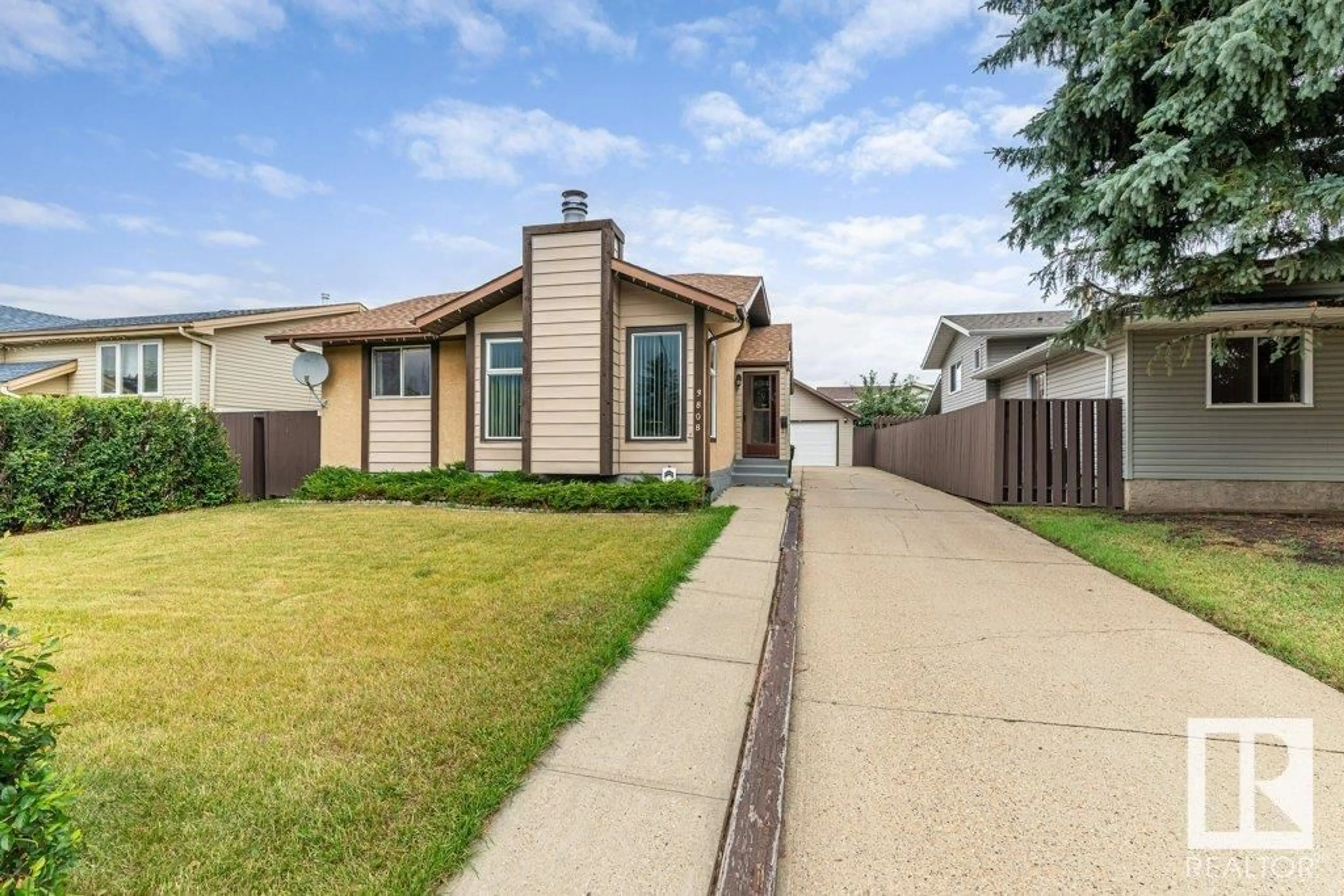 Home with vinyl exterior material, street for 3808 17A AV, Edmonton Alberta T6L2R4