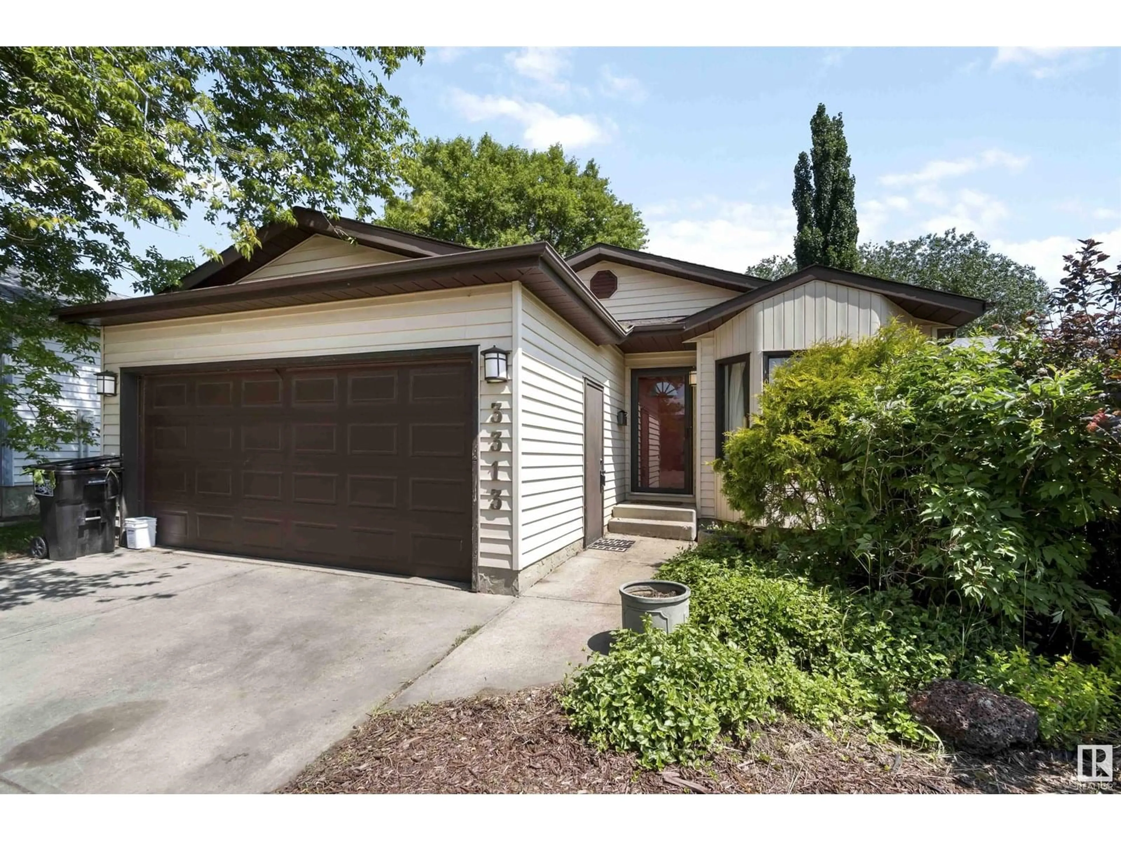 Home with vinyl exterior material, street for NW - 3313 43 ST, Edmonton Alberta T6L5Z6