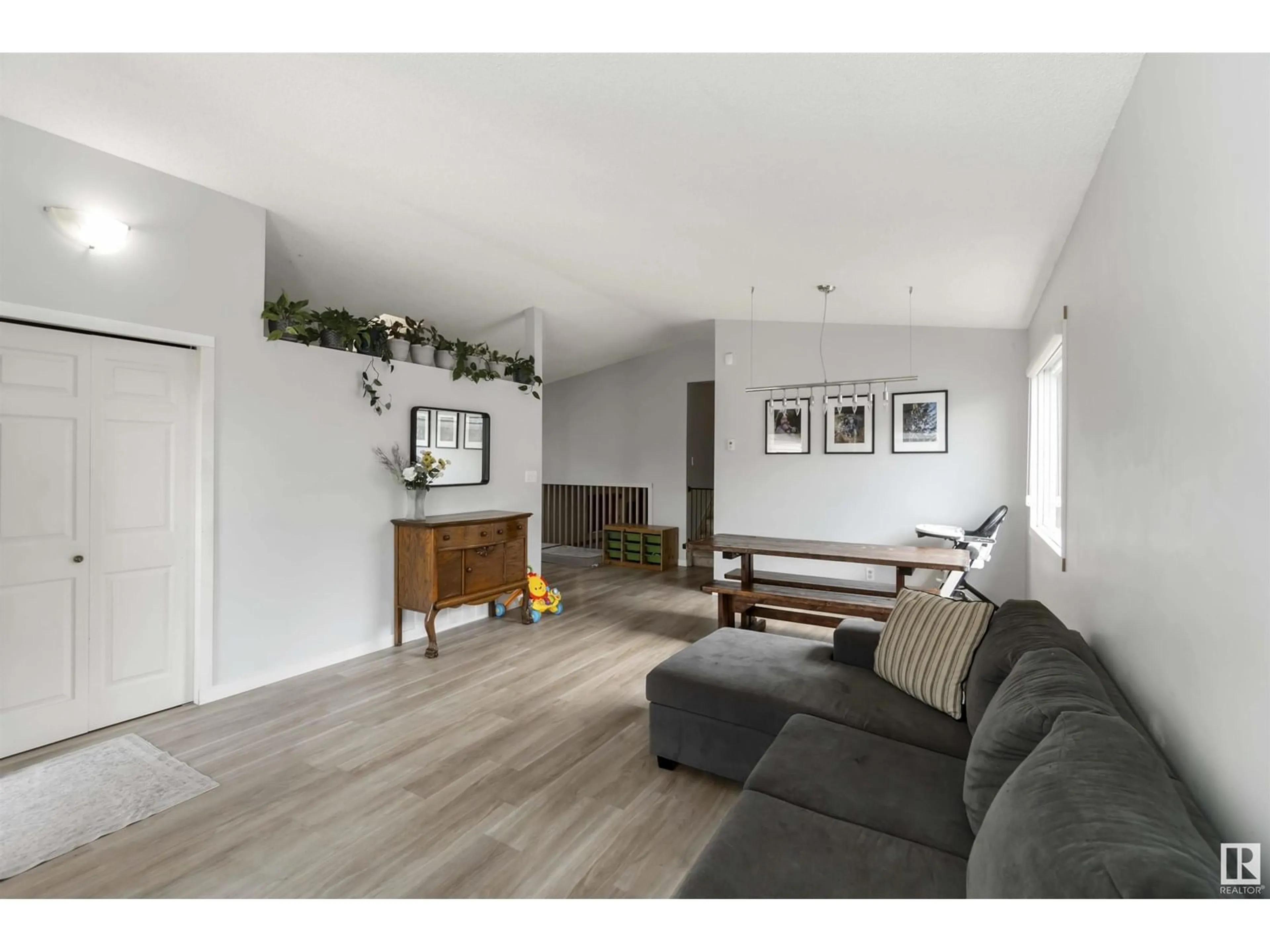 Living room with furniture, wood/laminate floor for NW - 3313 43 ST, Edmonton Alberta T6L5Z6