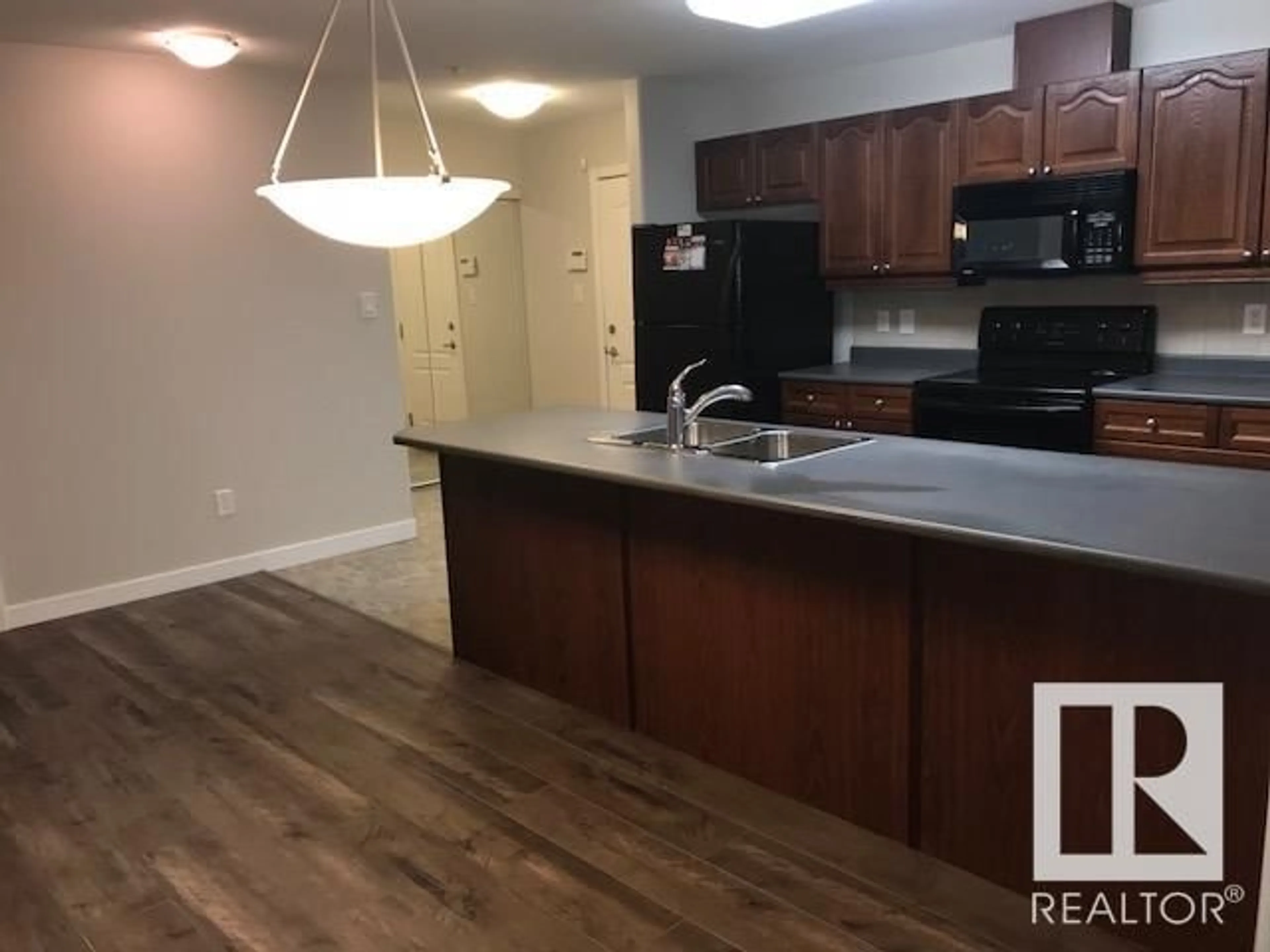 Open concept kitchen, unknown for 592 - 126 HOOKE RD, Edmonton Alberta T5A5H2
