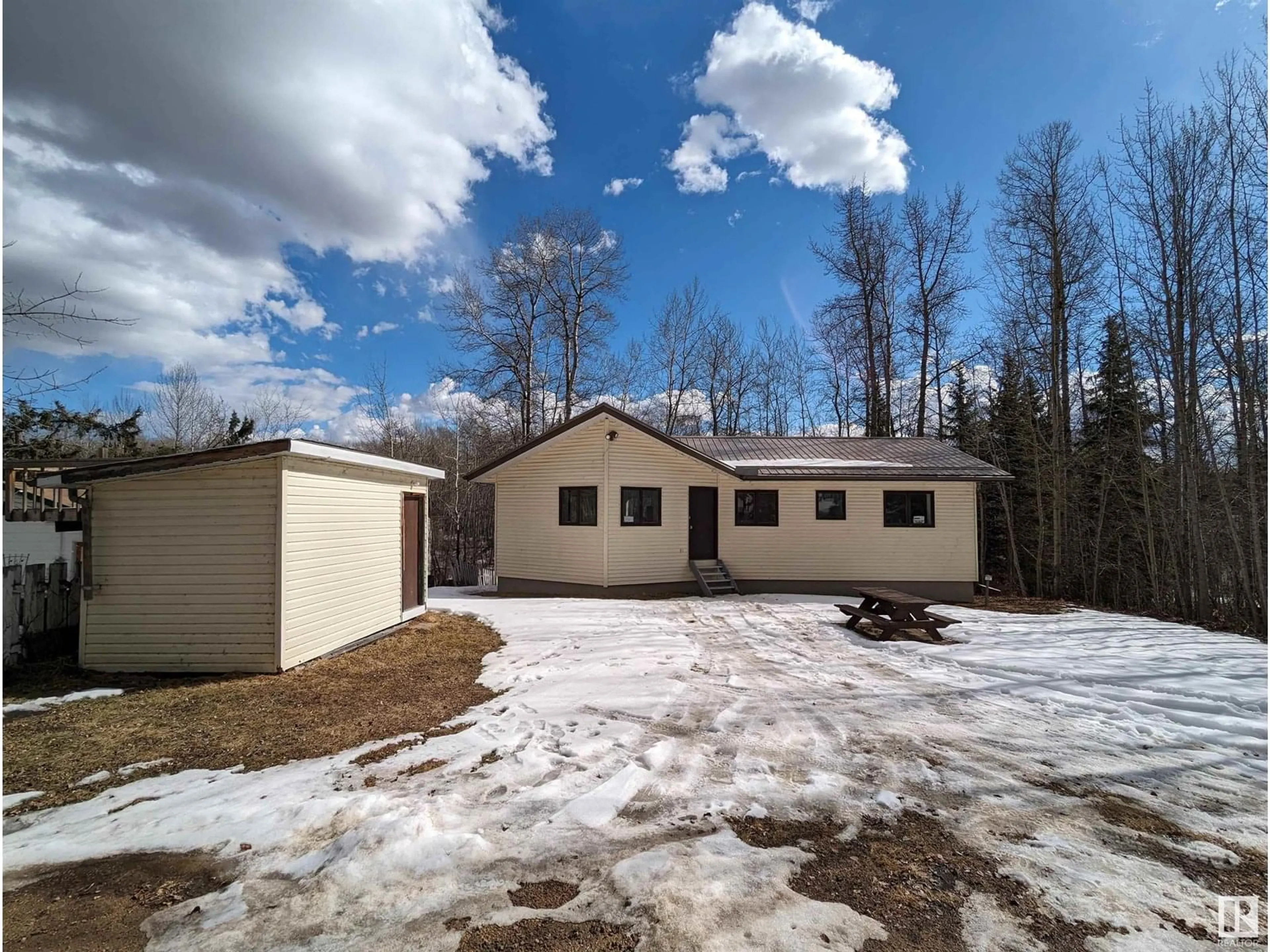 A pic from outside/outdoor area/front of a property/back of a property/a pic from drone, unknown for 5415 - 163 TWP RD 594, Rural Barrhead County Alberta T7N1N2