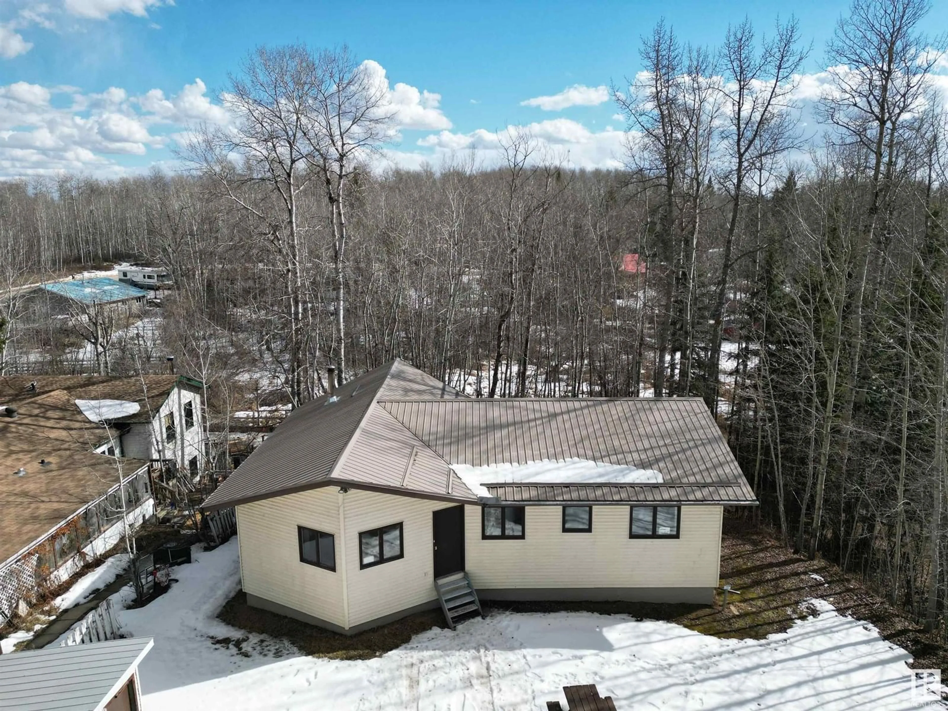 A pic from outside/outdoor area/front of a property/back of a property/a pic from drone, mountain view for 5415 - 163 TWP RD 594, Rural Barrhead County Alberta T7N1N2