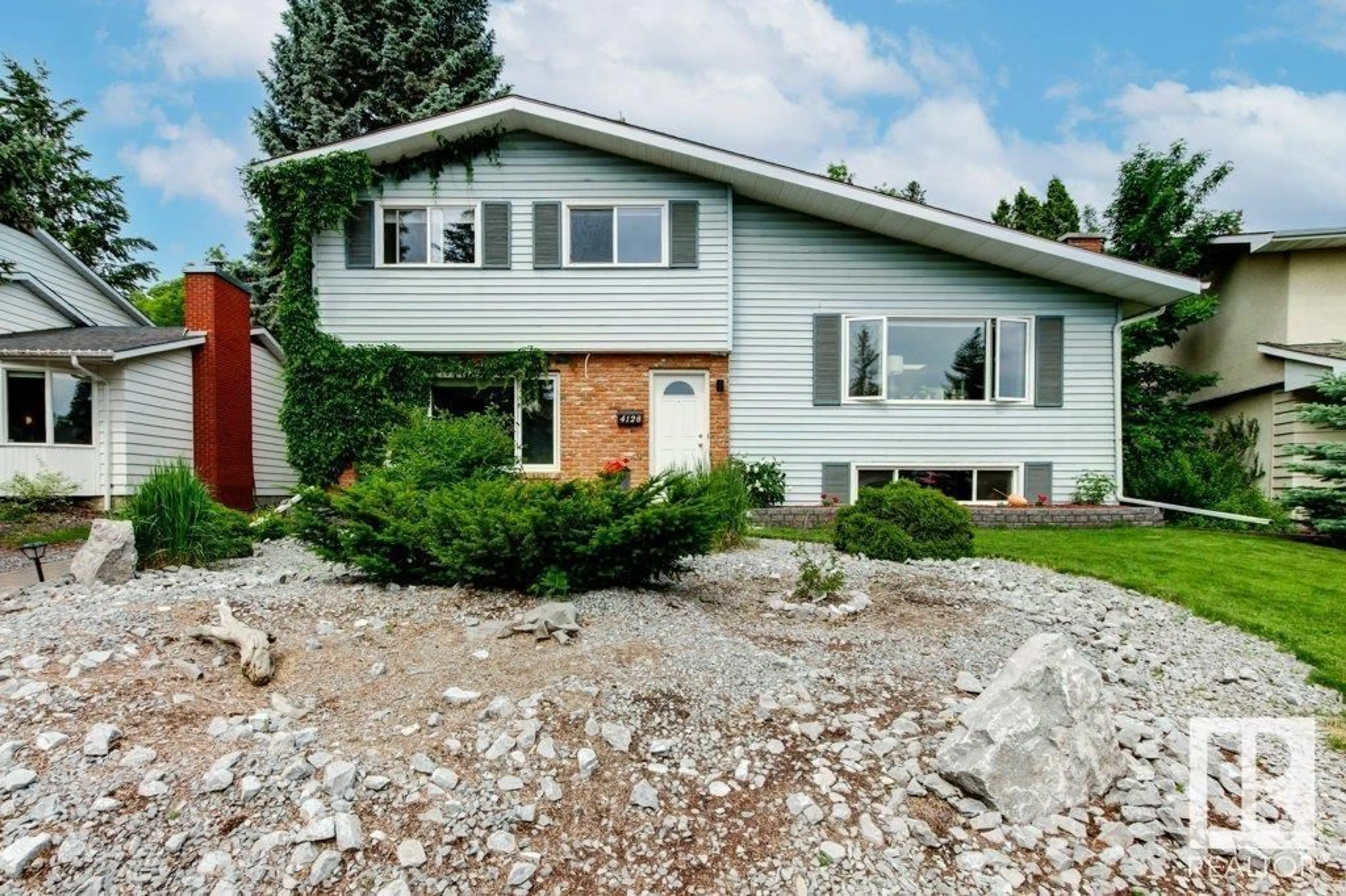 Home with vinyl exterior material, street for NW - 4128 126 ST, Edmonton Alberta T6J2A4