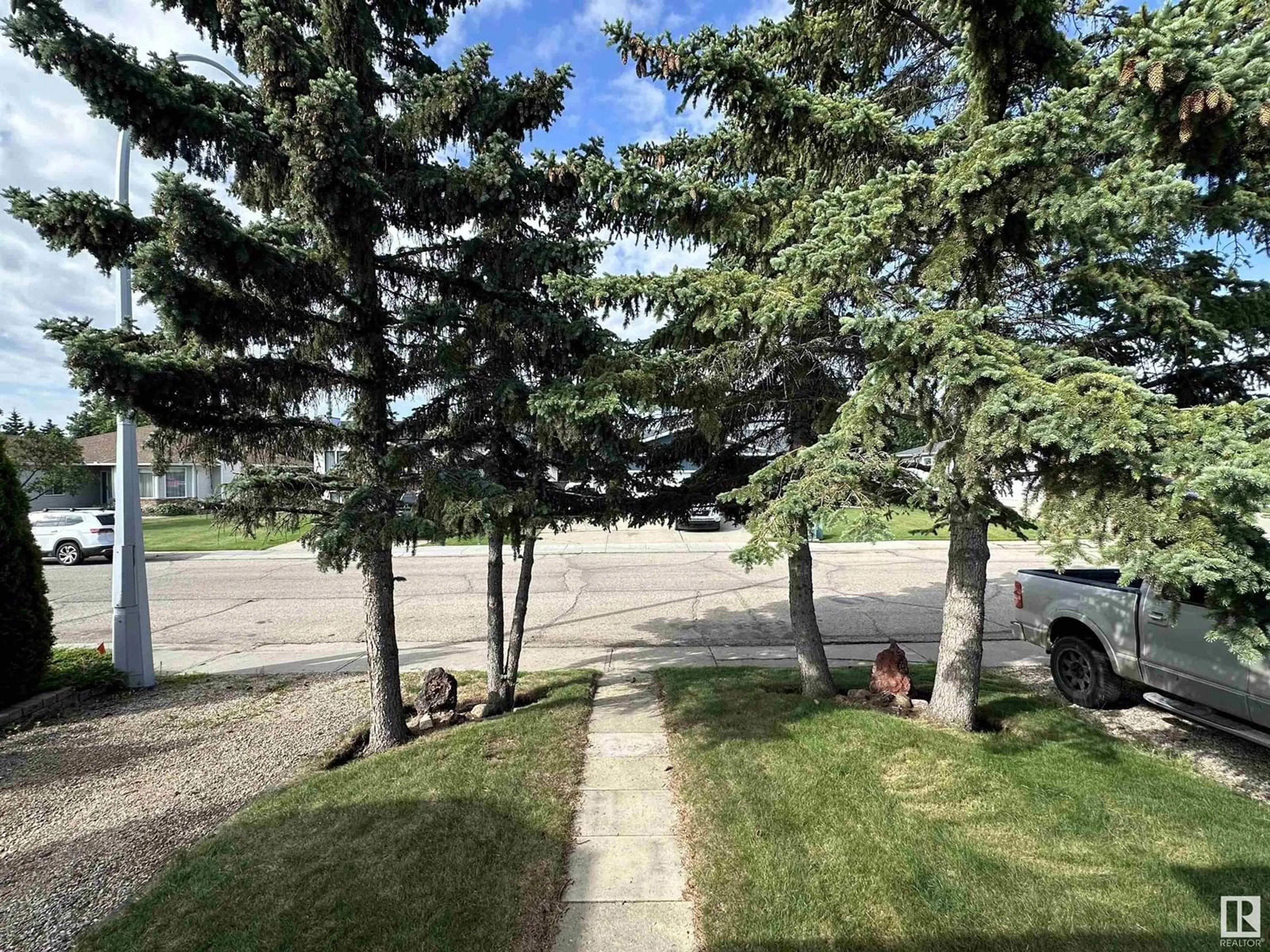A pic from outside/outdoor area/front of a property/back of a property/a pic from drone, unknown for 4122 43B AV, Leduc Alberta T9E4T7