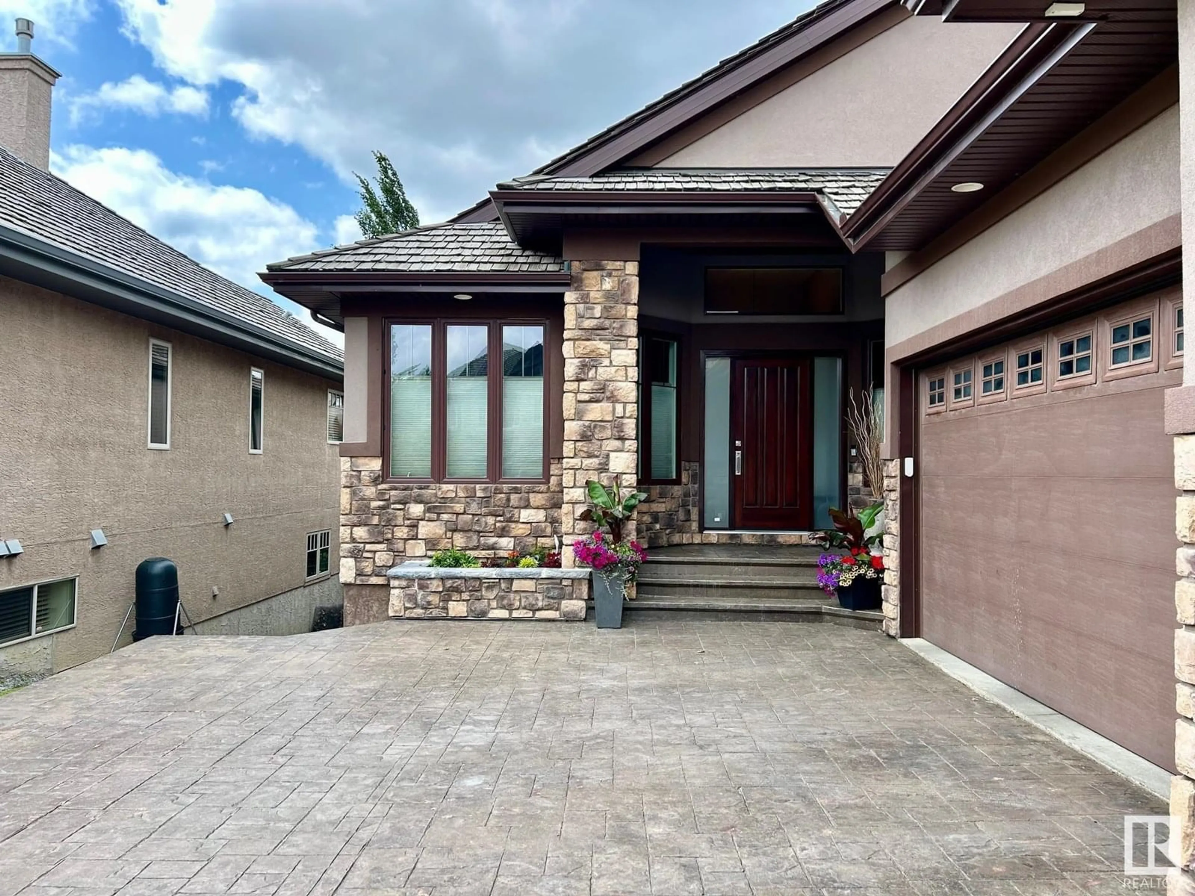 Home with brick exterior material, street for 4908 MACTAGGART CO, Edmonton Alberta T6R0J6