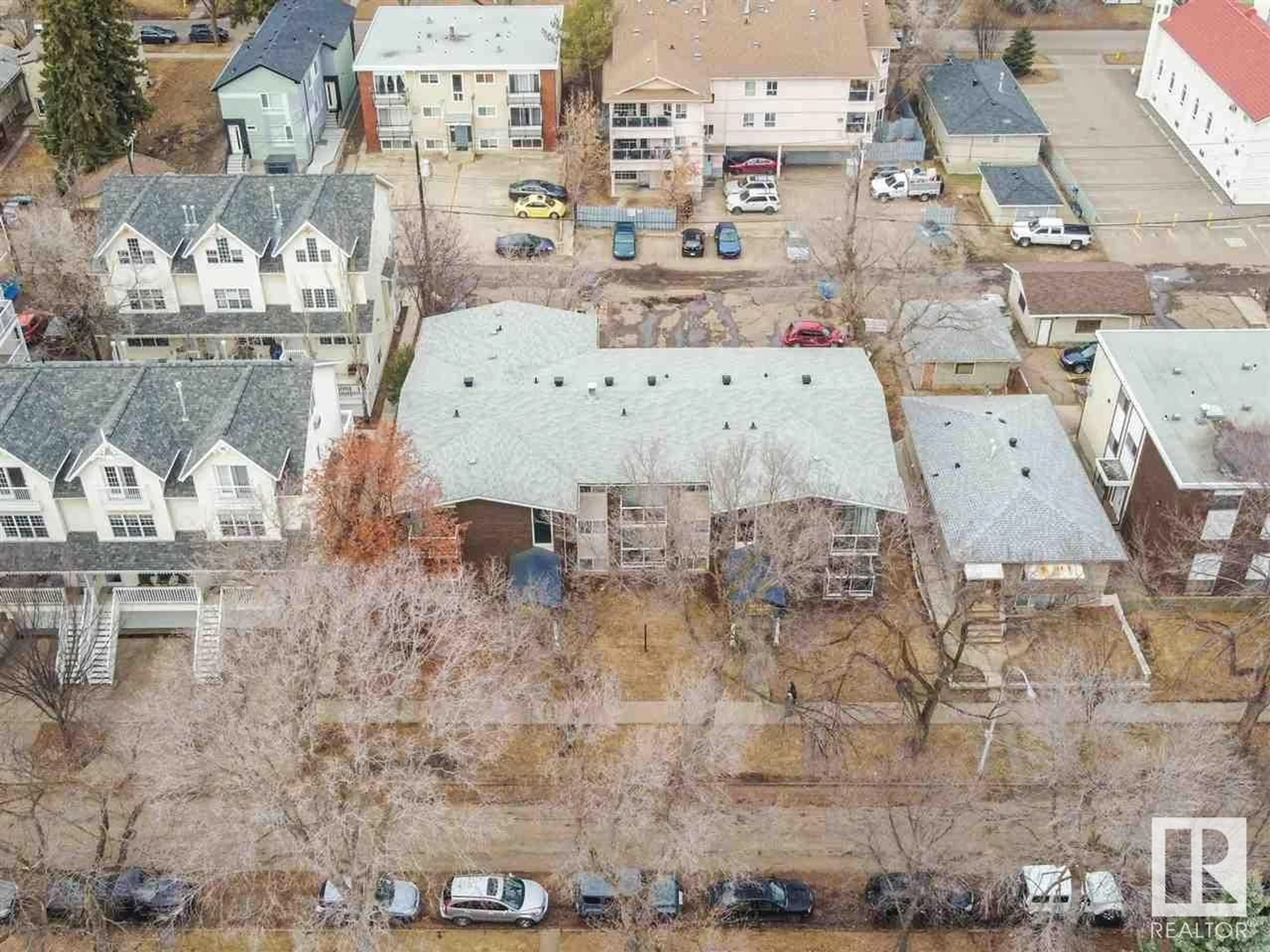 A pic from outside/outdoor area/front of a property/back of a property/a pic from drone, street for 201 - 10738 85 AV NW, Edmonton Alberta T6E2K8