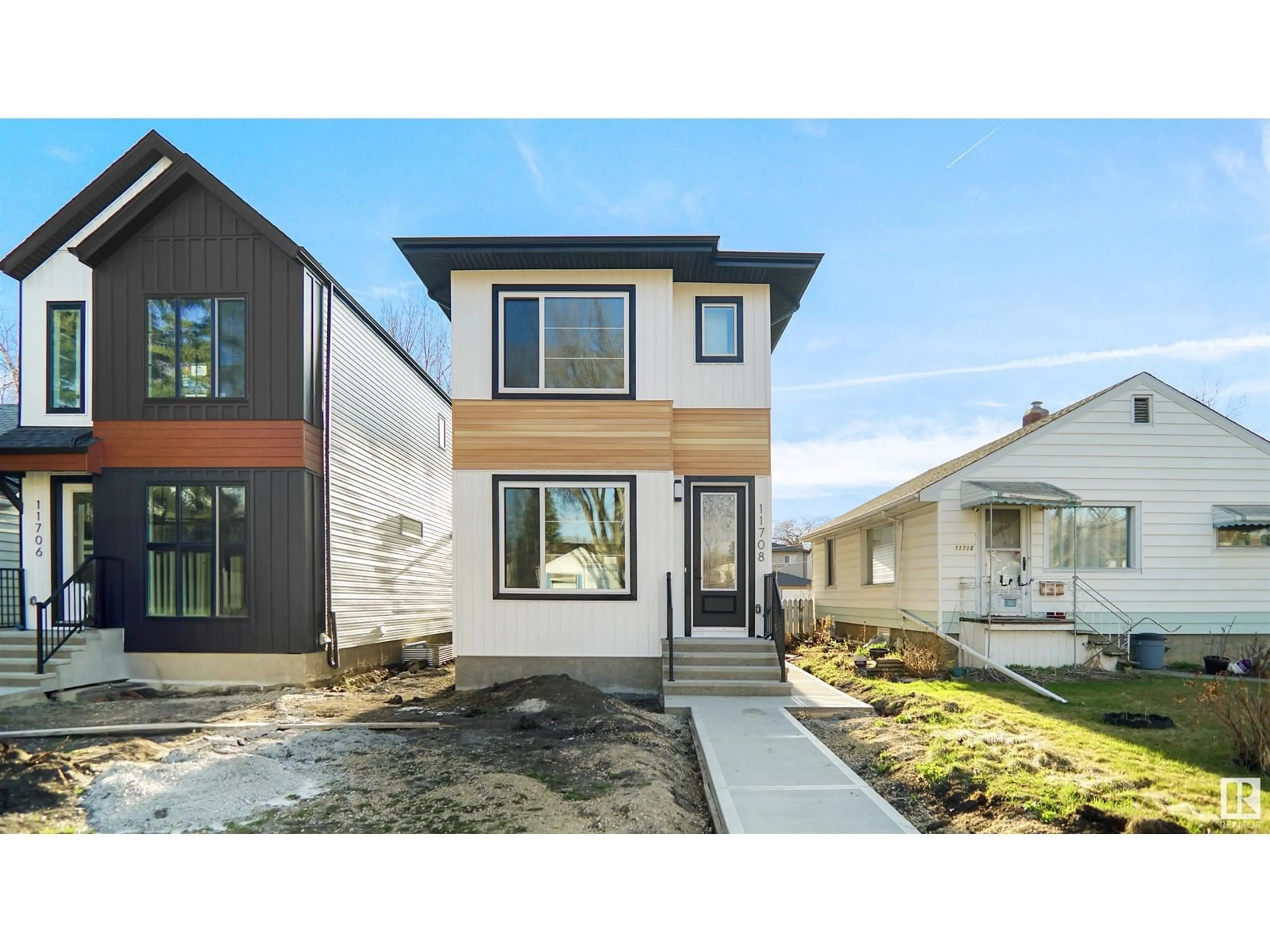 Home with vinyl exterior material, street for 11708 126 ST, Edmonton Alberta T5M0S2