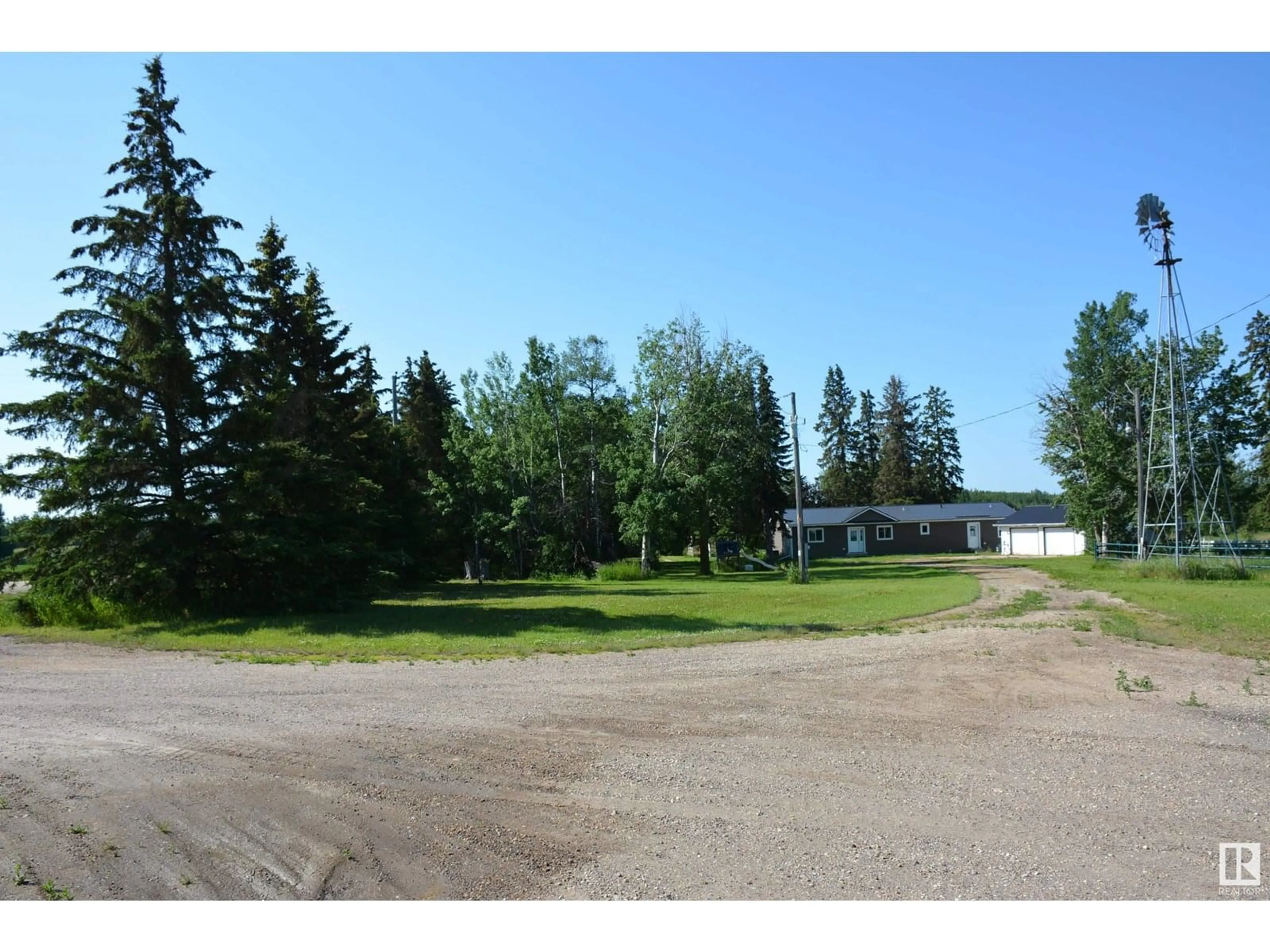 A pic from outside/outdoor area/front of a property/back of a property/a pic from drone, water/lake/river/ocean view for 56126 HWY 764, Rural Lac Ste. Anne County Alberta T0E0J0