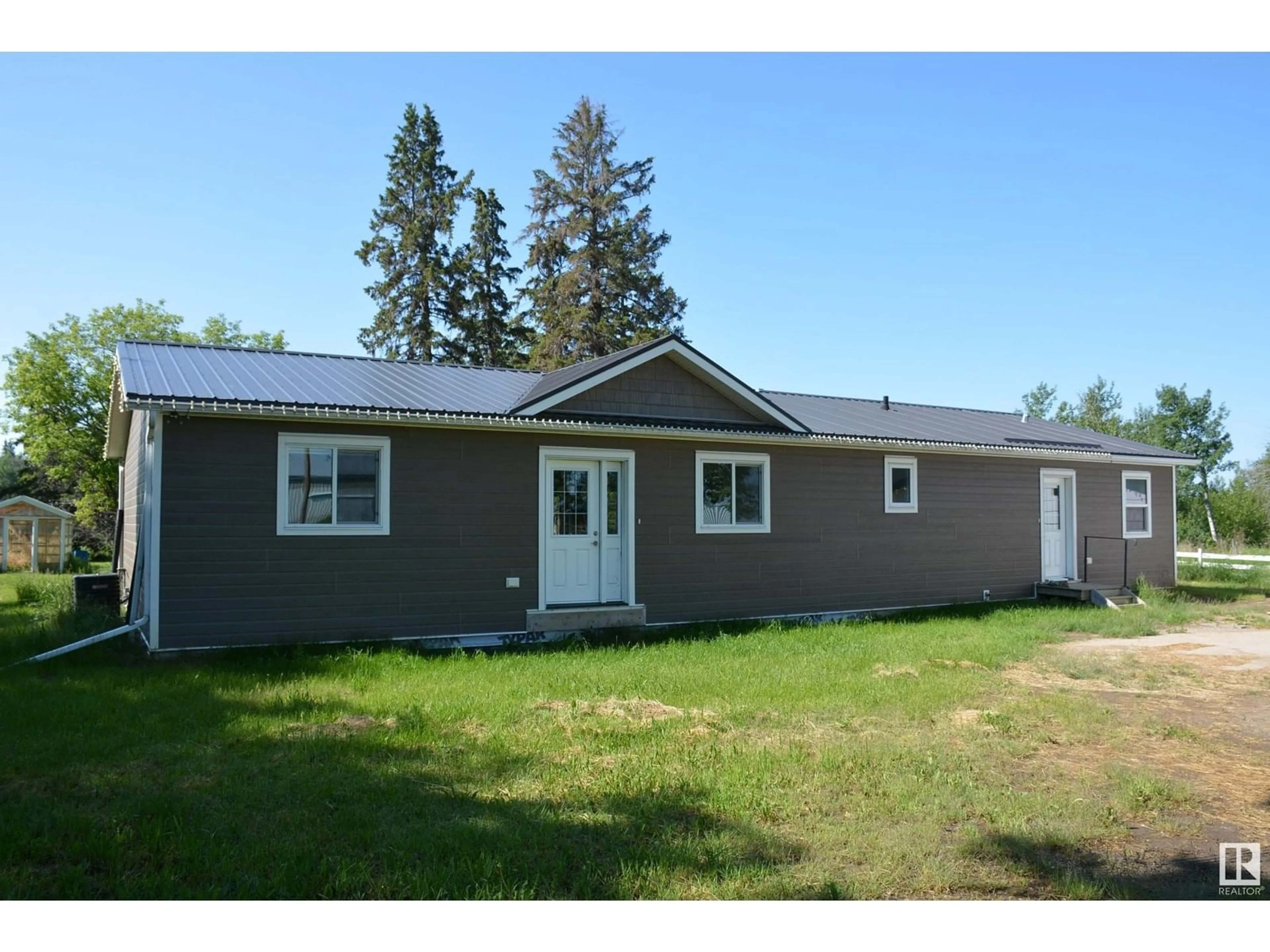 Home with vinyl exterior material, building for 56126 HWY 764, Rural Lac Ste. Anne County Alberta T0E0J0