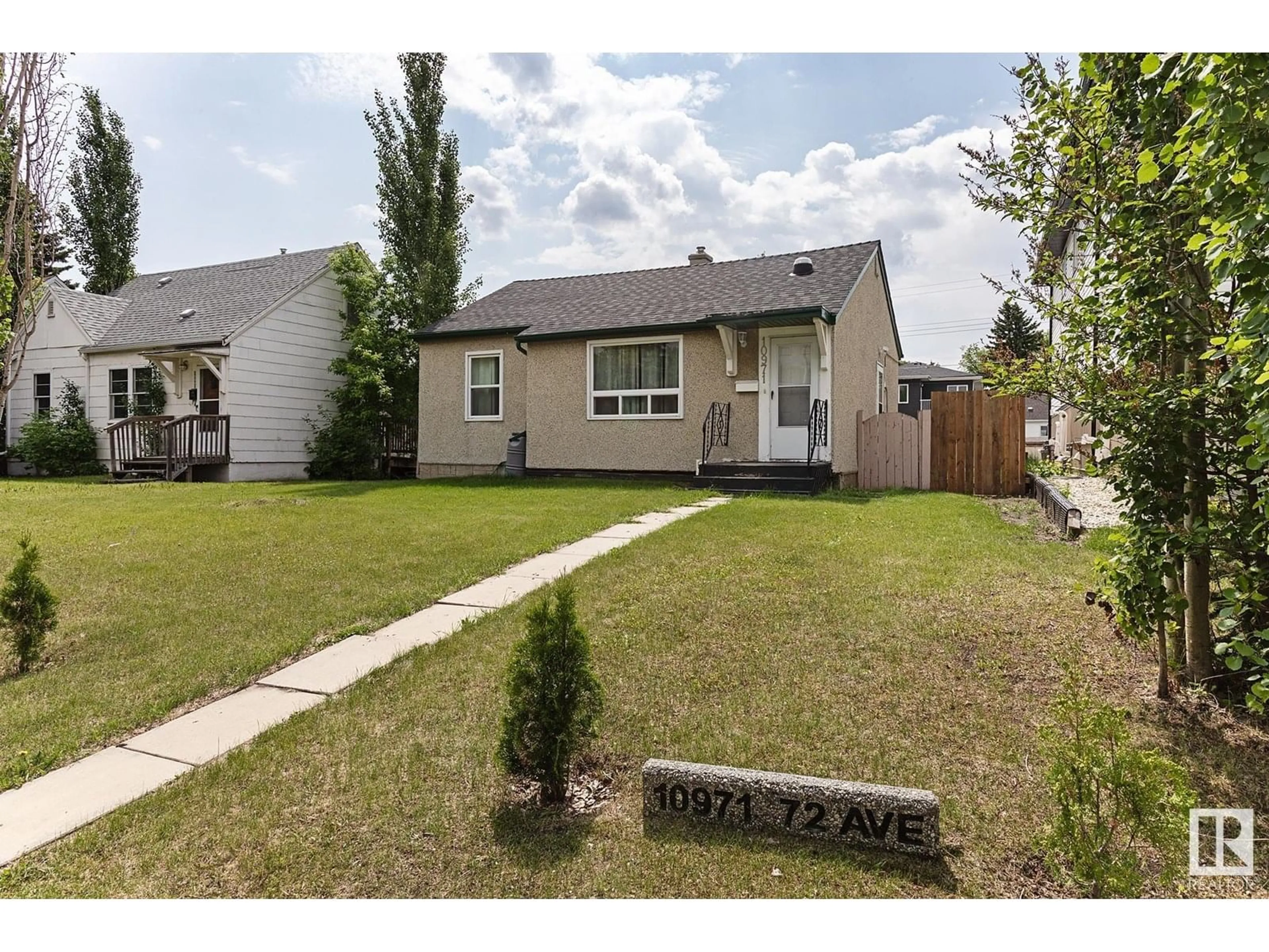 Home with vinyl exterior material, street for 10971 72 AV, Edmonton Alberta T6G0B1