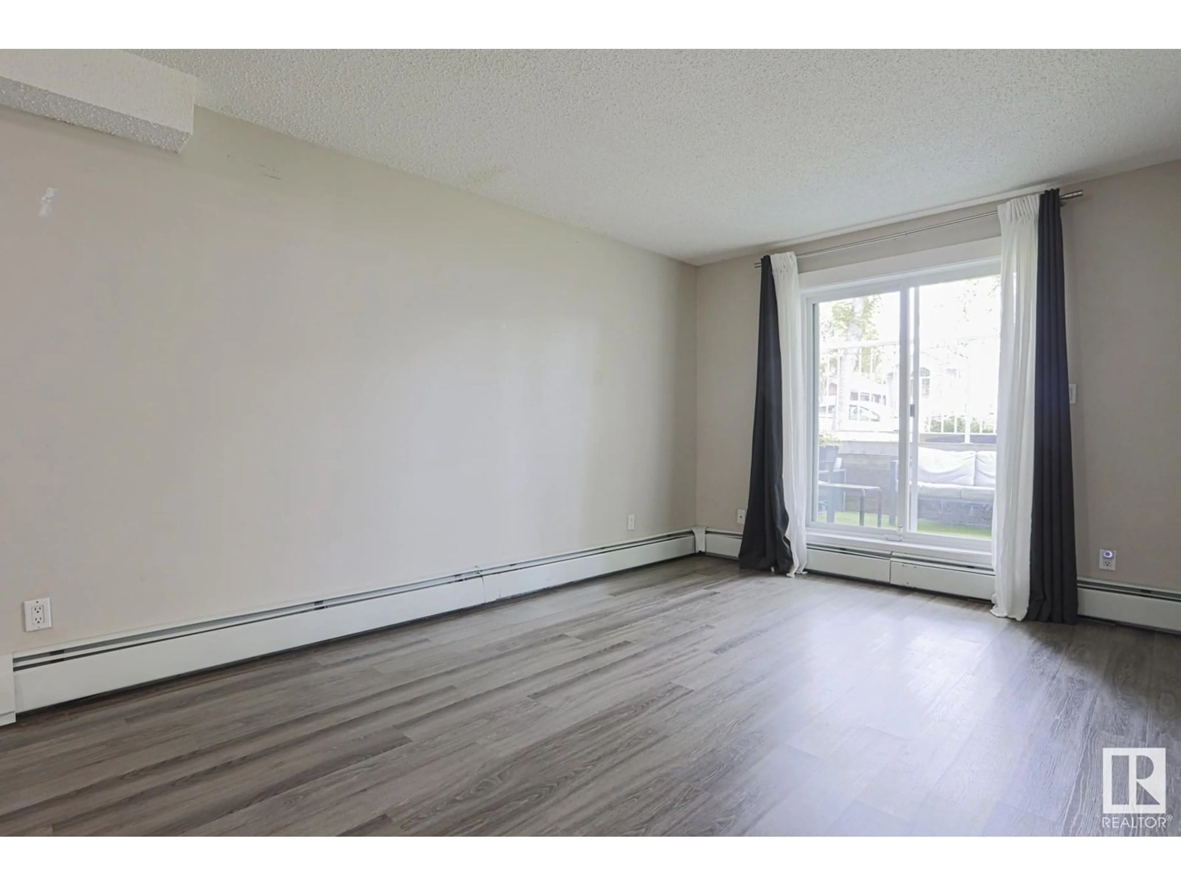 A pic of a room for #104 - 11324 97 ST, Edmonton Alberta T5G1X4