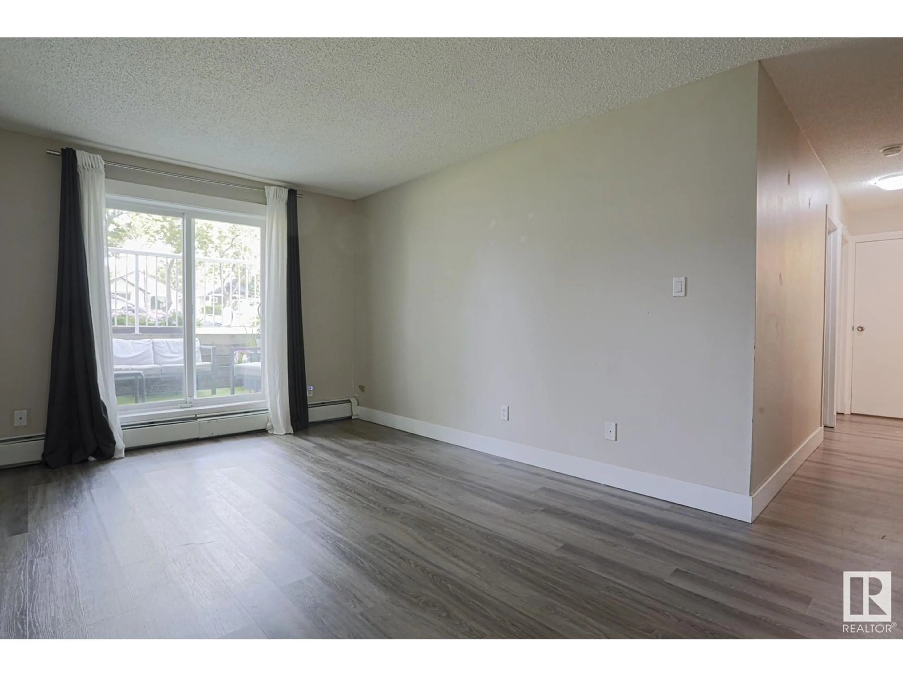 A pic of a room for #104 - 11324 97 ST, Edmonton Alberta T5G1X4