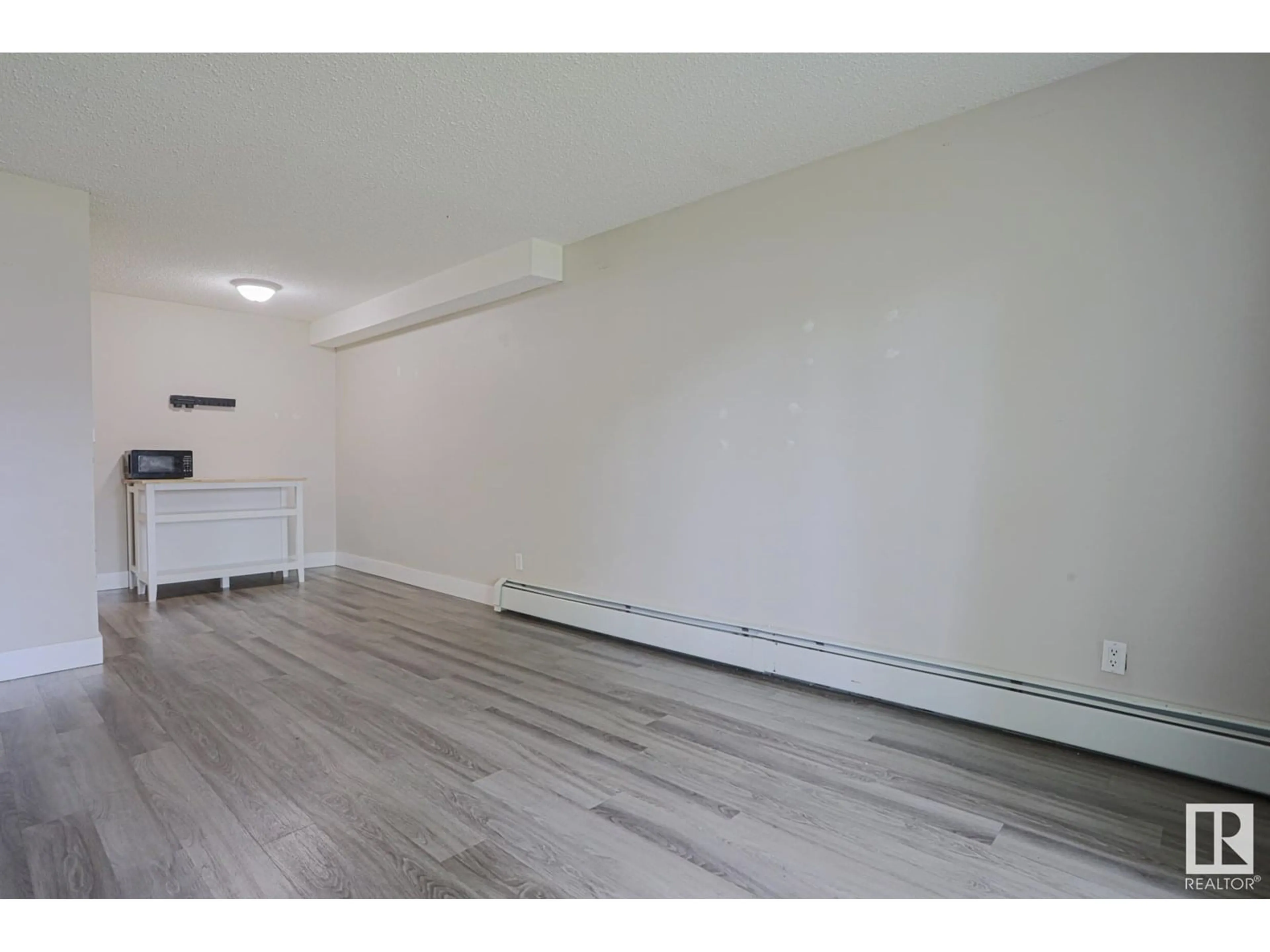 A pic of a room for #104 - 11324 97 ST, Edmonton Alberta T5G1X4