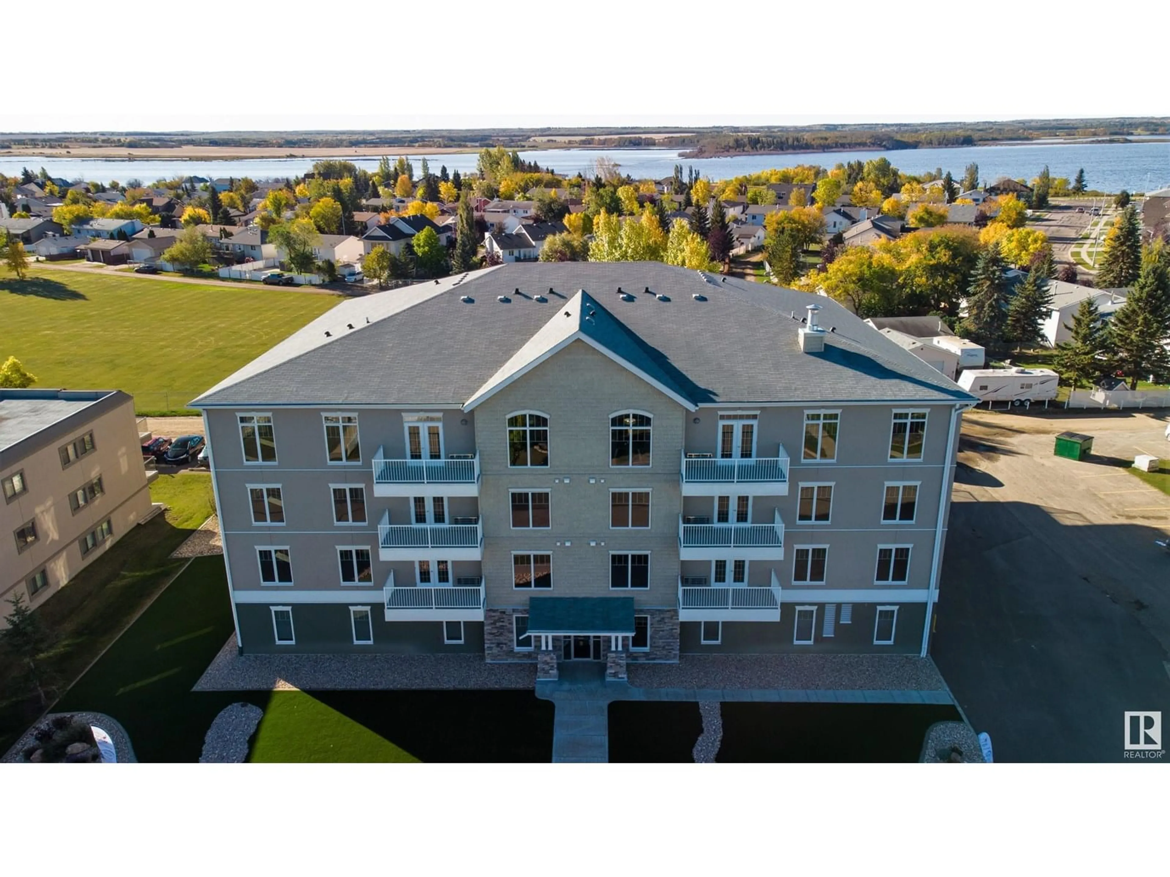 A pic from outside/outdoor area/front of a property/back of a property/a pic from drone, building for #102 - 4110 43 AV, Bonnyville Town Alberta T9N1S8
