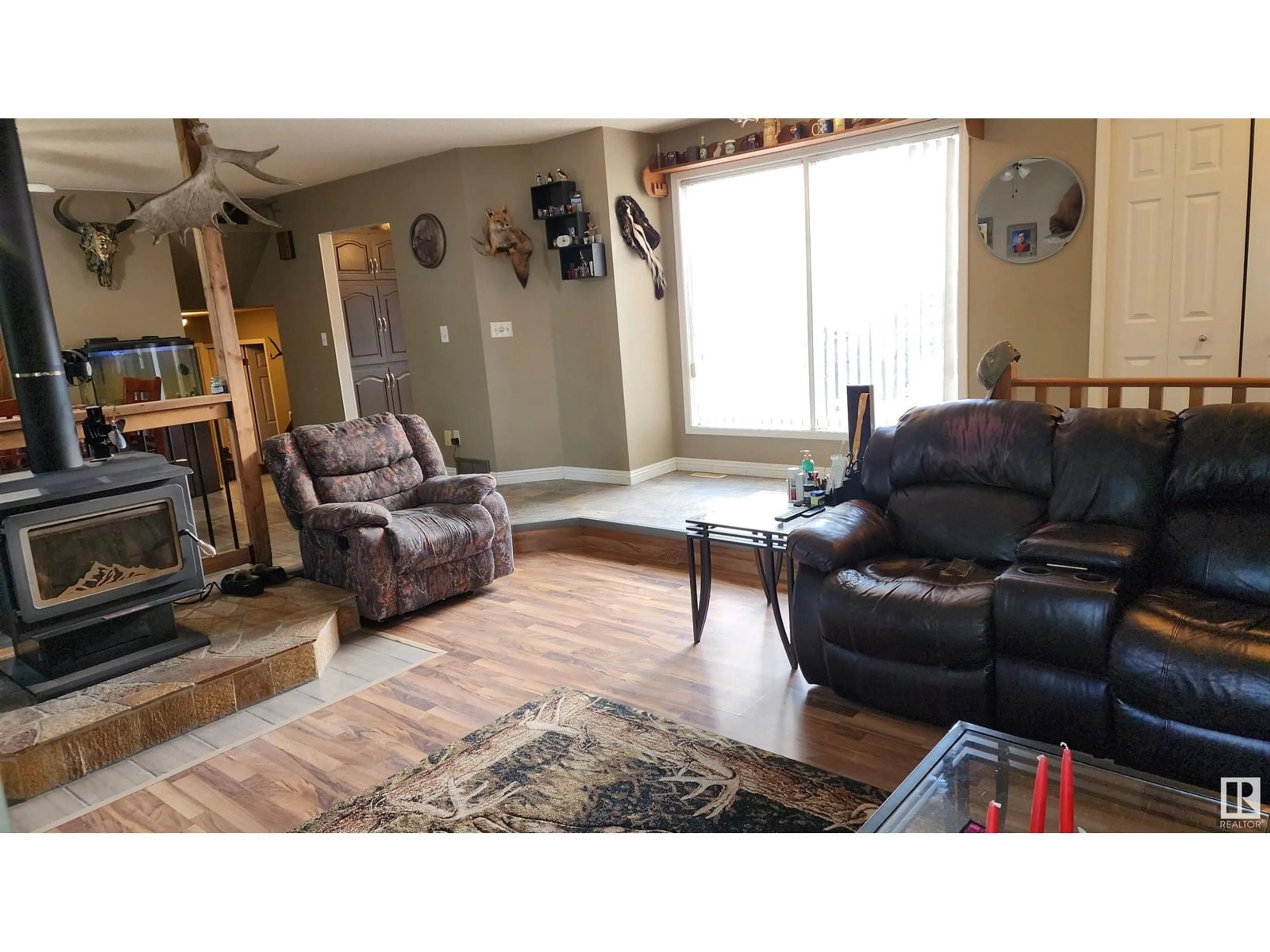 Living room with furniture, wood/laminate floor for 5101 58 AV, Elk Point Alberta T0A1A0