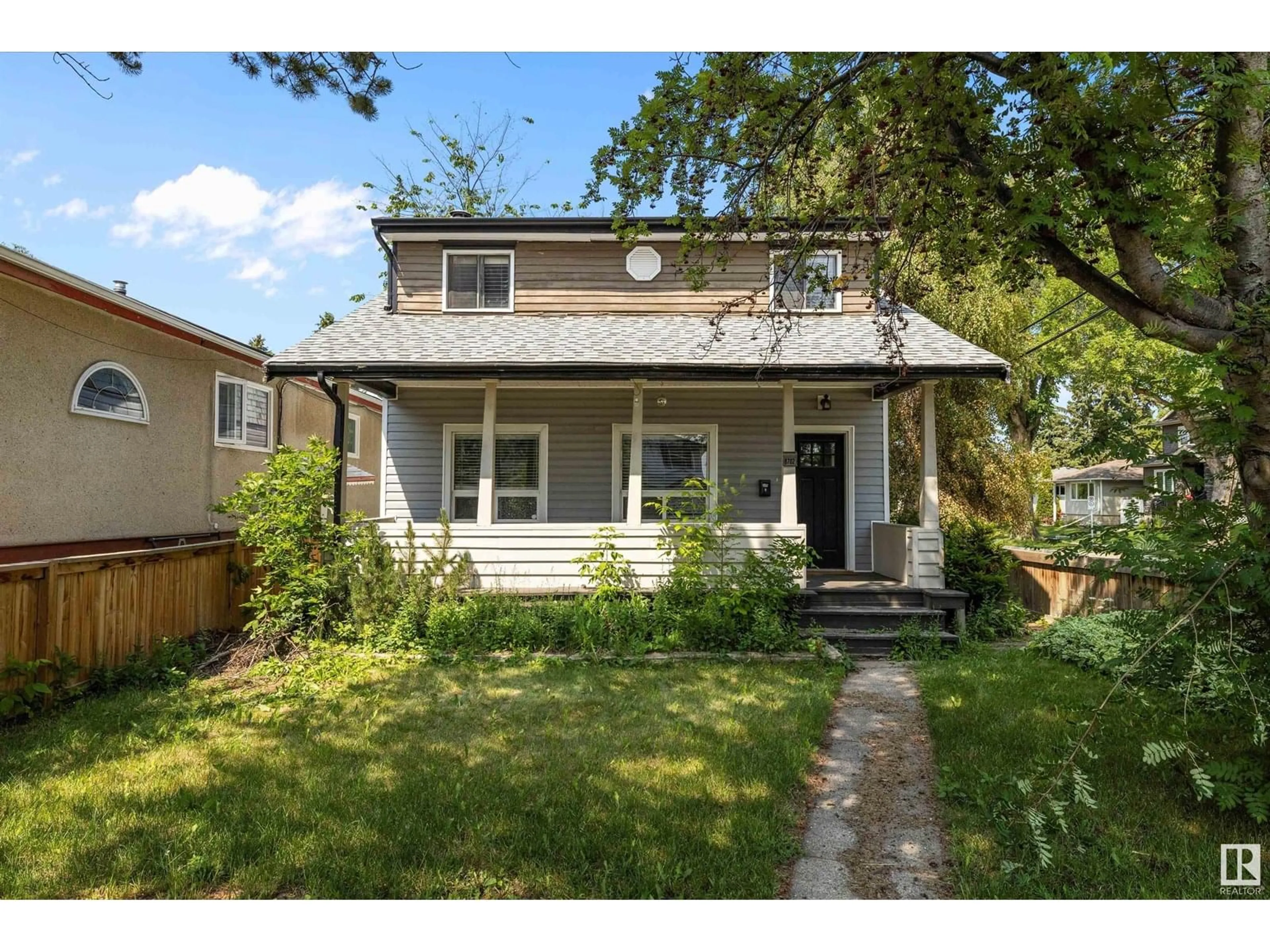 Home with vinyl exterior material, street for 8702 92A AV, Edmonton Alberta T6C1S6