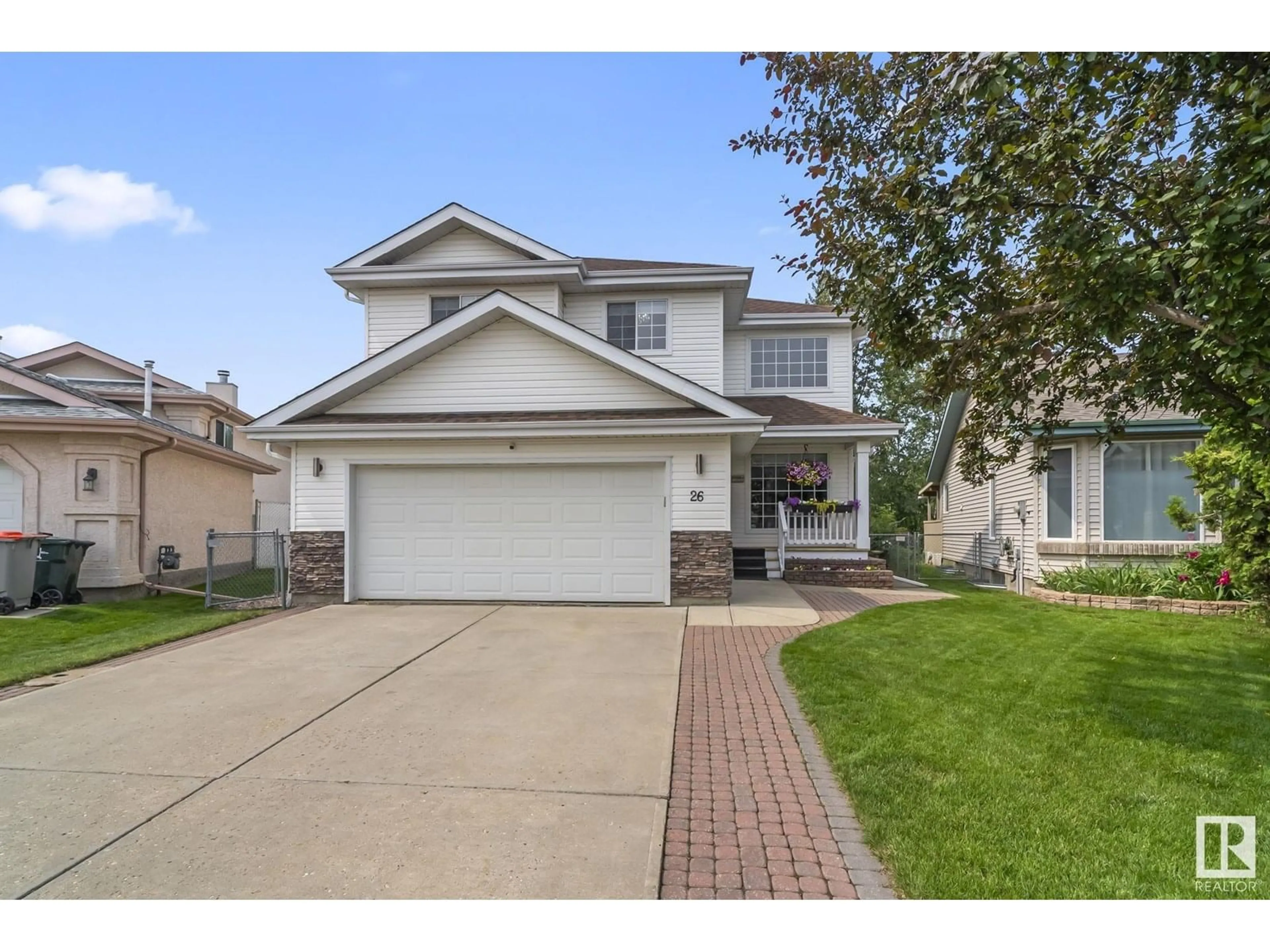 Home with vinyl exterior material, street for 26 LA COSTA FAIRWAY CL, Stony Plain Alberta T7Z2A5