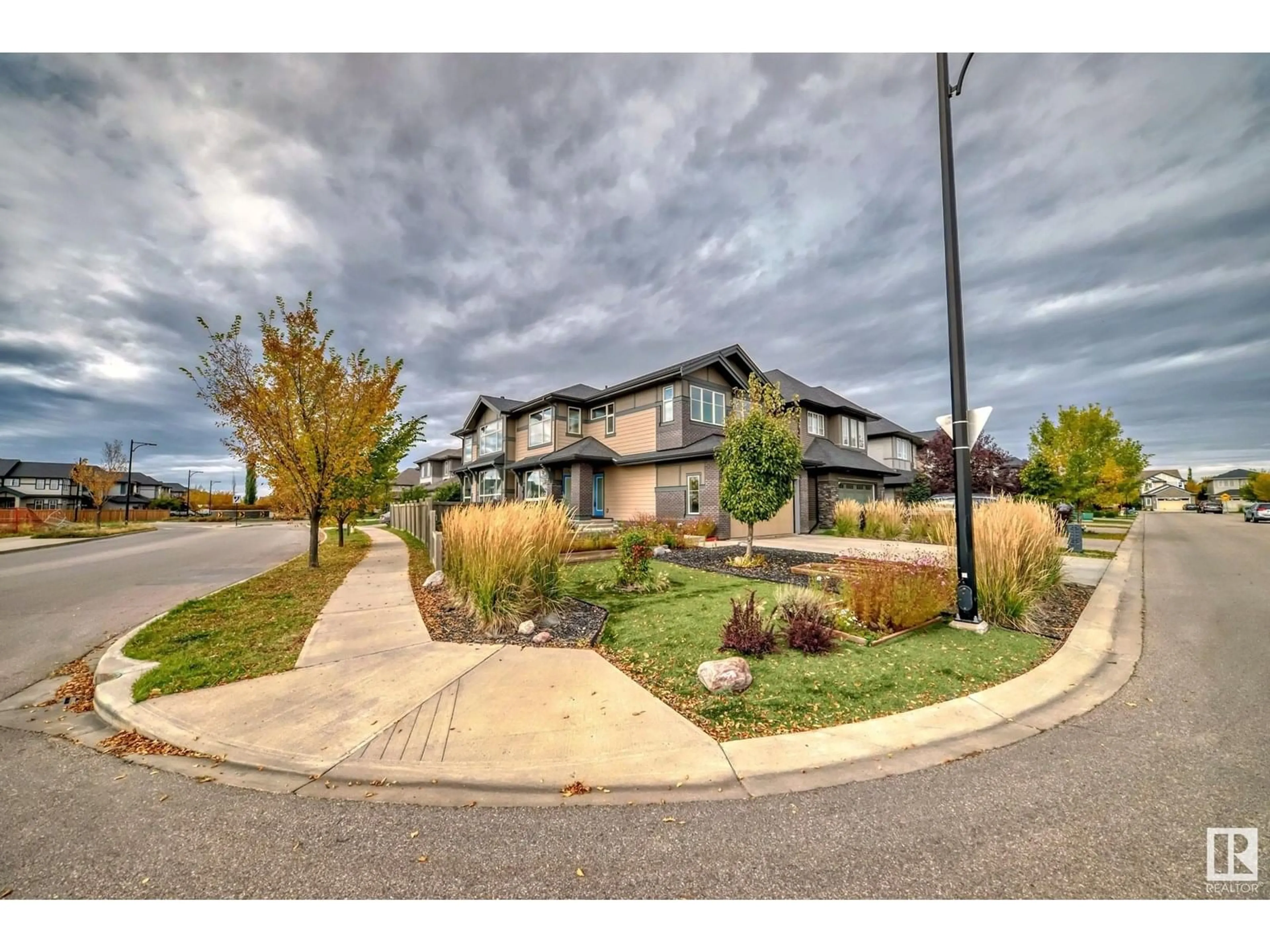 A pic from outside/outdoor area/front of a property/back of a property/a pic from drone, street for 3104 ALLAN LANDING LD, Edmonton Alberta T6W2R7