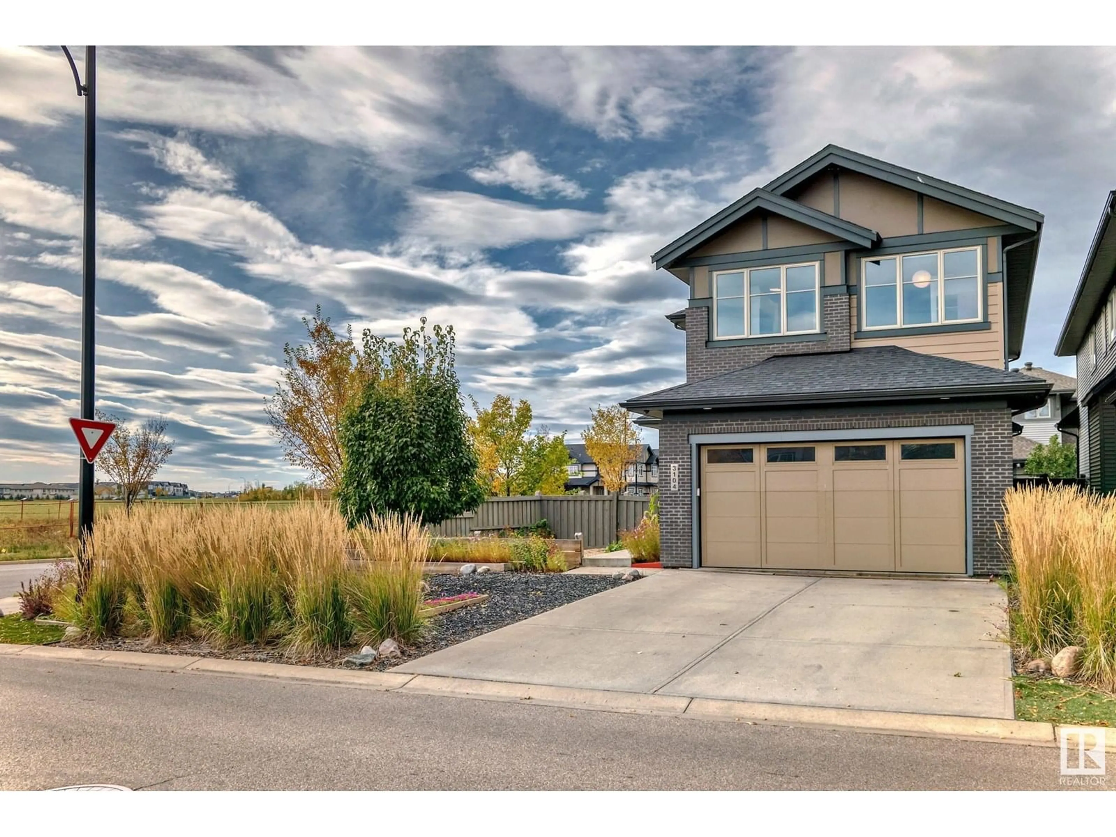 Home with vinyl exterior material, street for 3104 ALLAN LANDING LD, Edmonton Alberta T6W2R7