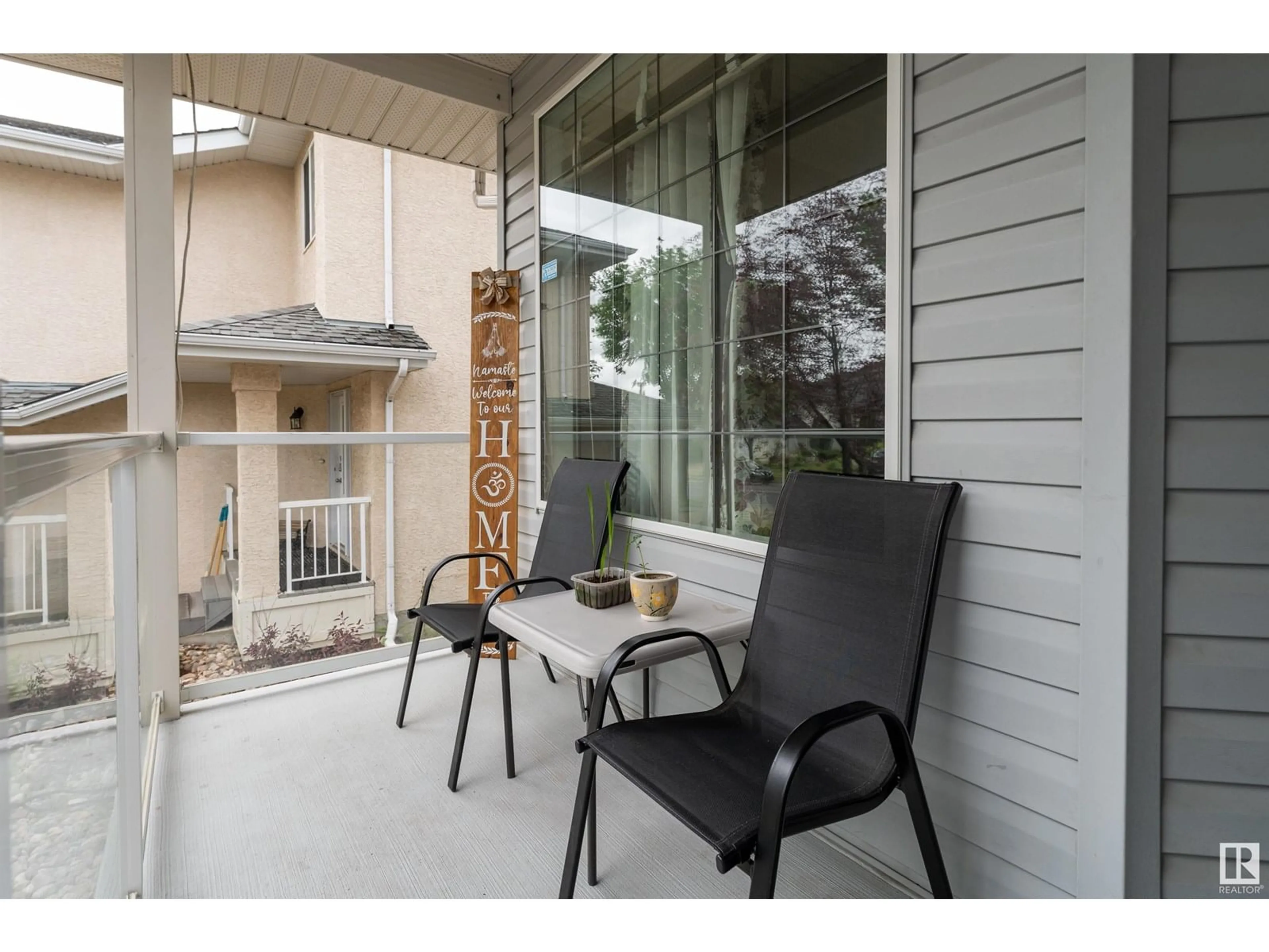 Patio, street for 387 HEATH RD, Edmonton Alberta T6R2T8