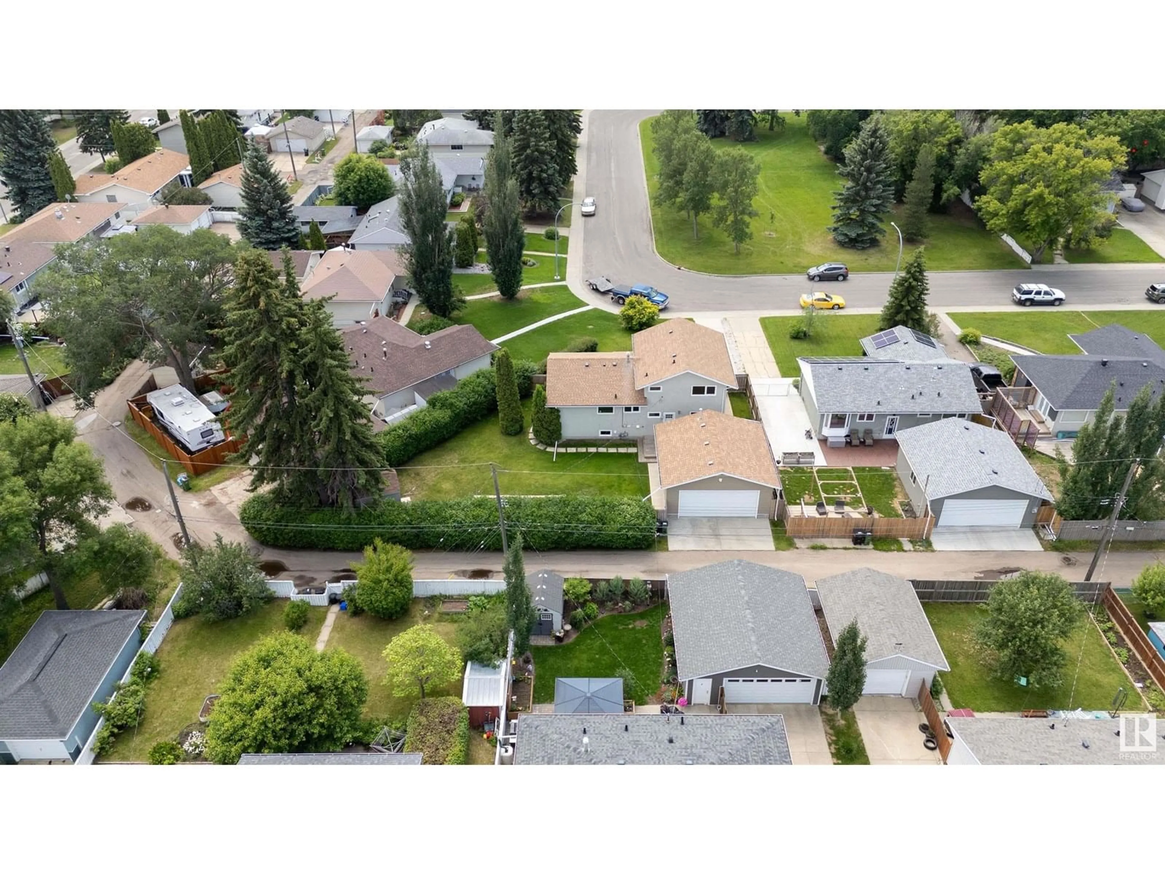 A pic from outside/outdoor area/front of a property/back of a property/a pic from drone, street for 15902 94 AV, Edmonton Alberta T5R5K8