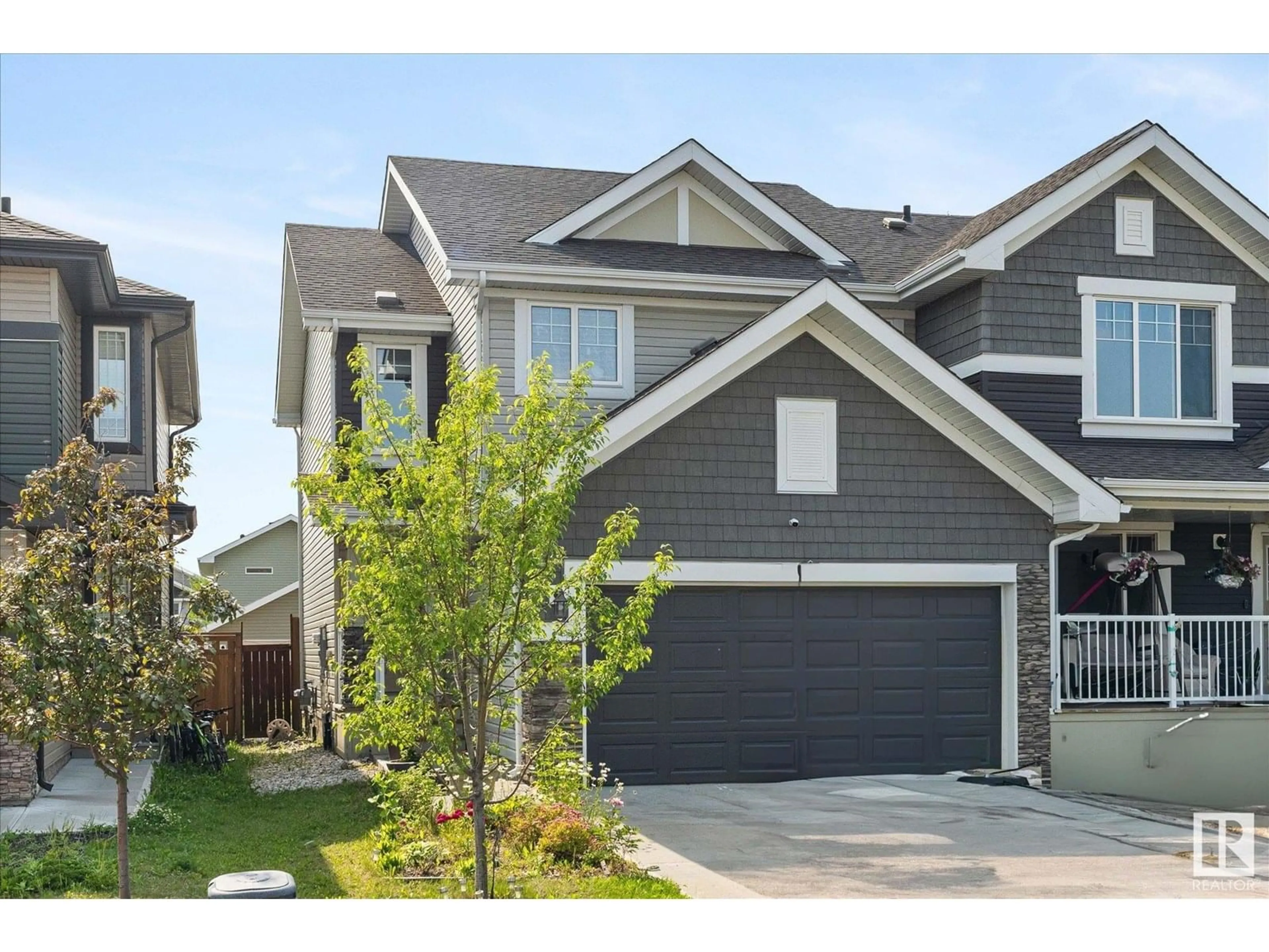 Home with vinyl exterior material, street for 14 SIERRA WD, Fort Saskatchewan Alberta T8L0T3
