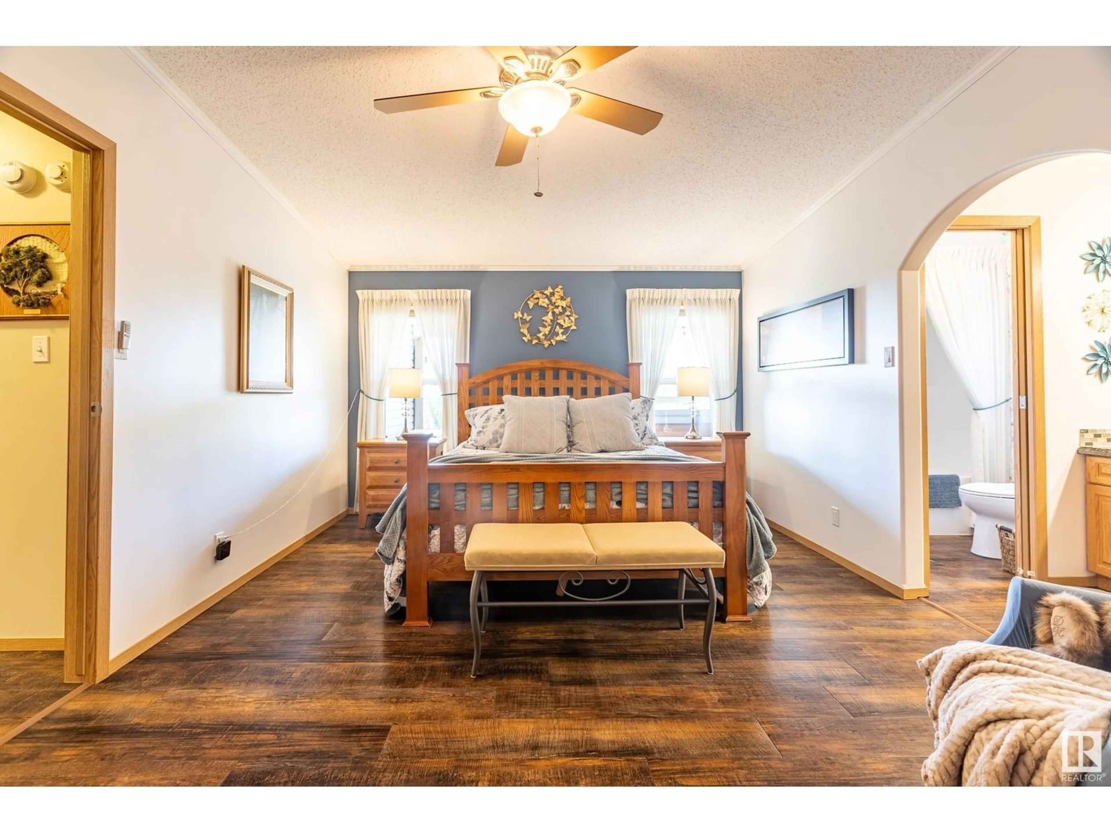 Bedroom with bed, wood/laminate floor for 57016 HWY 28, Rural Sturgeon County Alberta T0A1N0