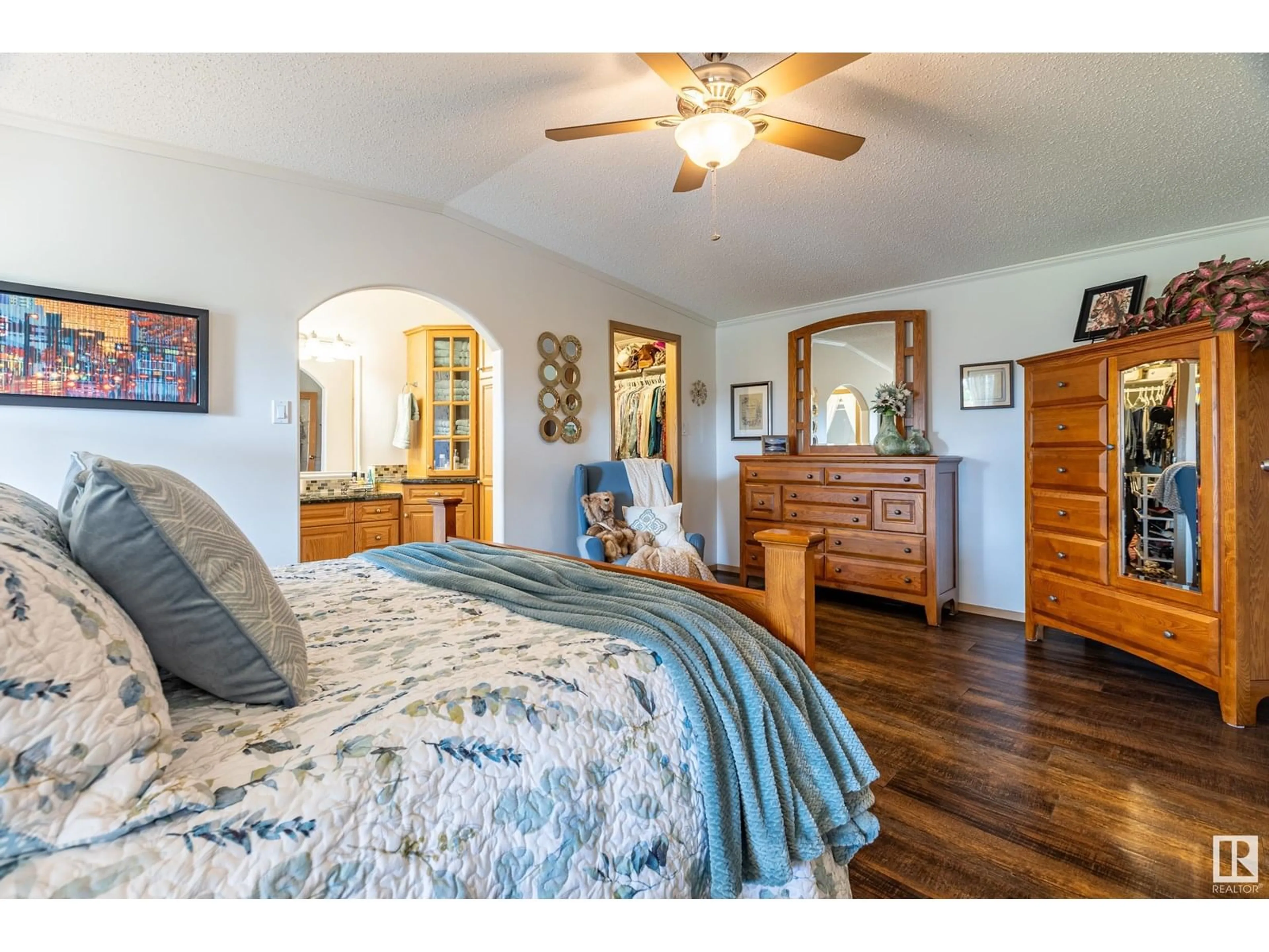 Bedroom with bed, wood/laminate floor for 57016 HWY 28, Rural Sturgeon County Alberta T0A1N0
