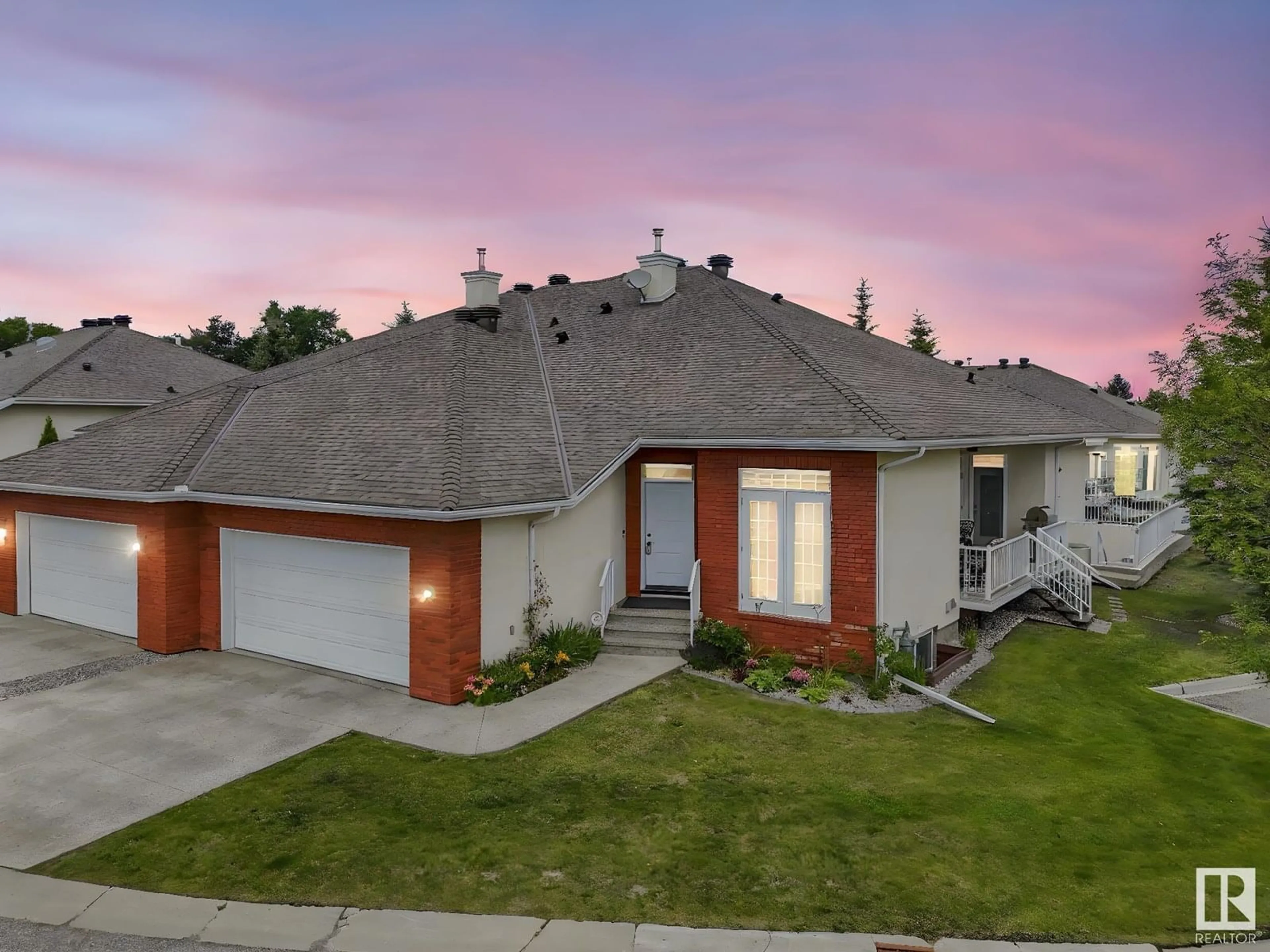A pic from outside/outdoor area/front of a property/back of a property/a pic from drone, street for 1225 - 19 WANYANDI RD, Edmonton Alberta T6M2W7
