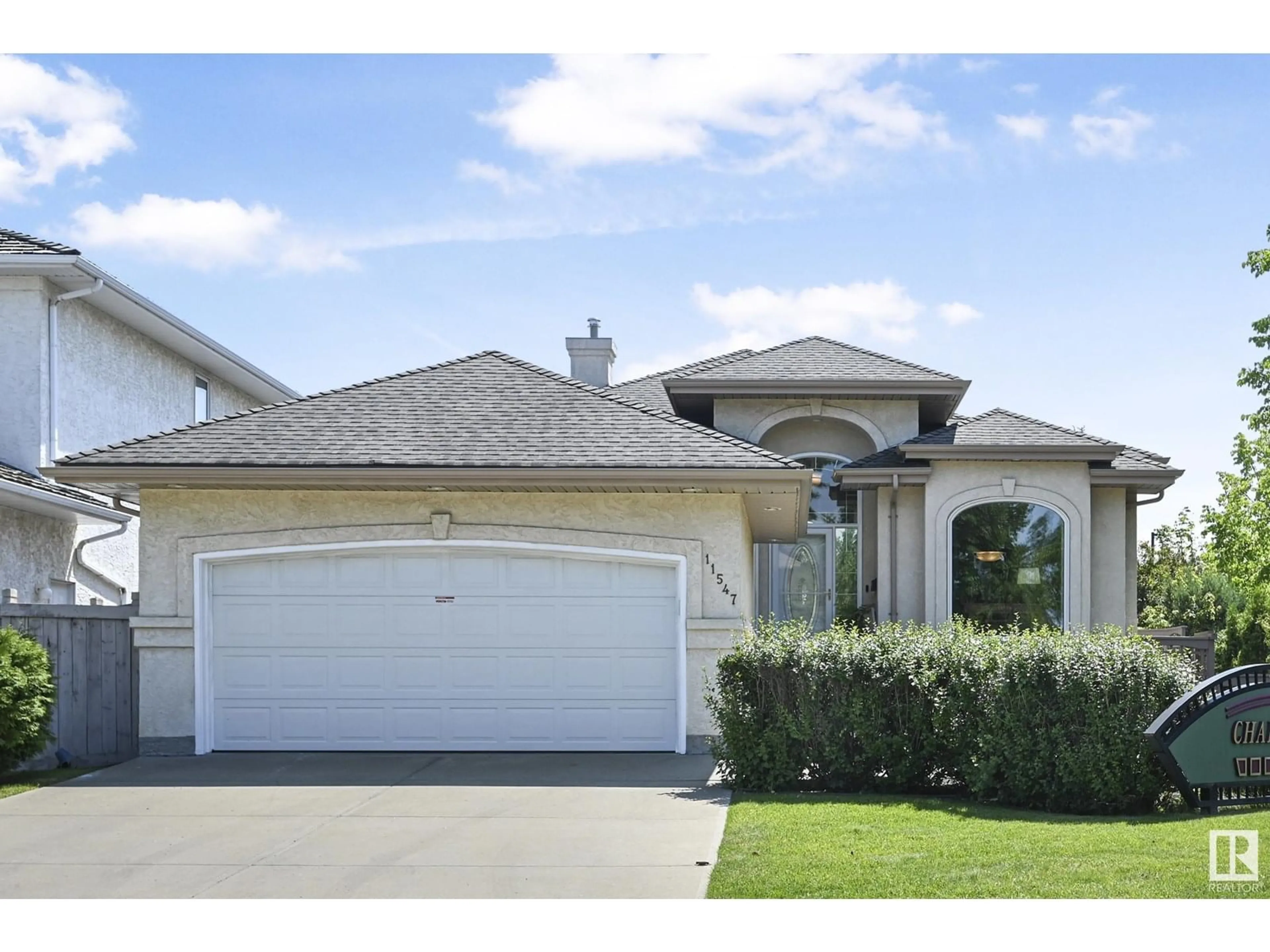 Home with vinyl exterior material, street for 11547 13 AV, Edmonton Alberta T6J7A8