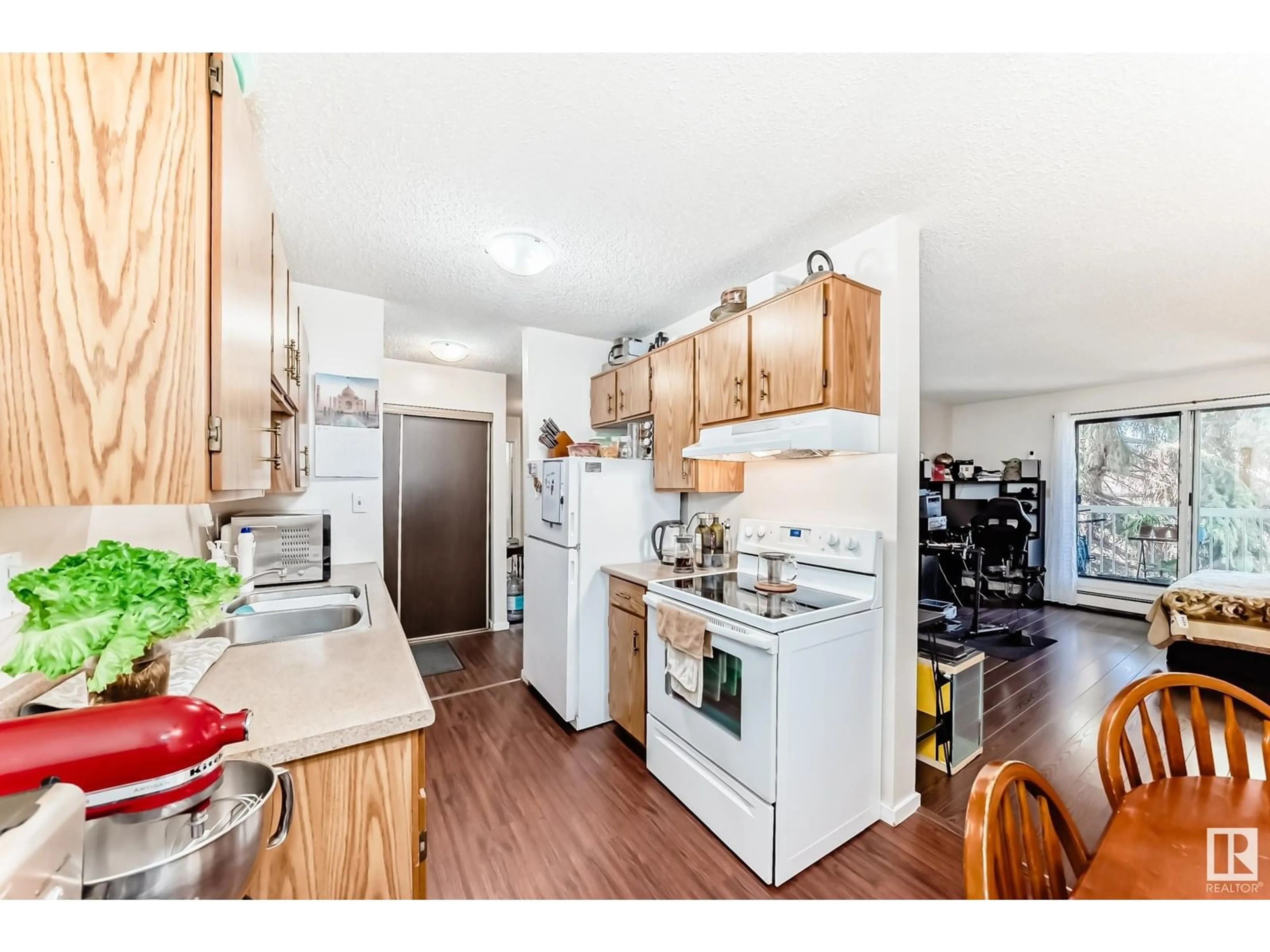 Standard kitchen, wood/laminate floor for #317 - 1945 105 ST, Edmonton Alberta T6J5N6