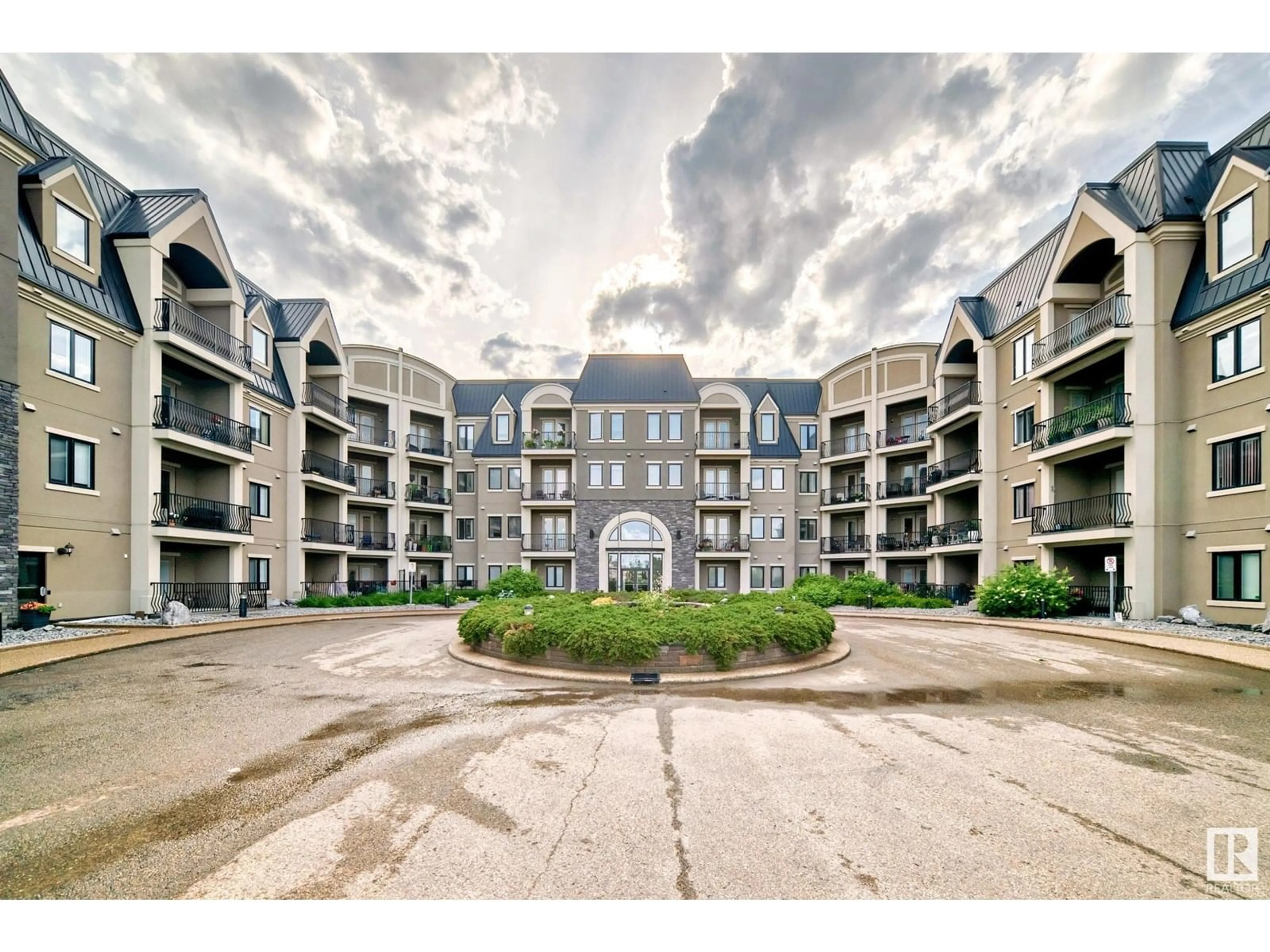 A pic from outside/outdoor area/front of a property/back of a property/a pic from drone, building for #434 - 6079 MAYNARD WY, Edmonton Alberta T6R0S4