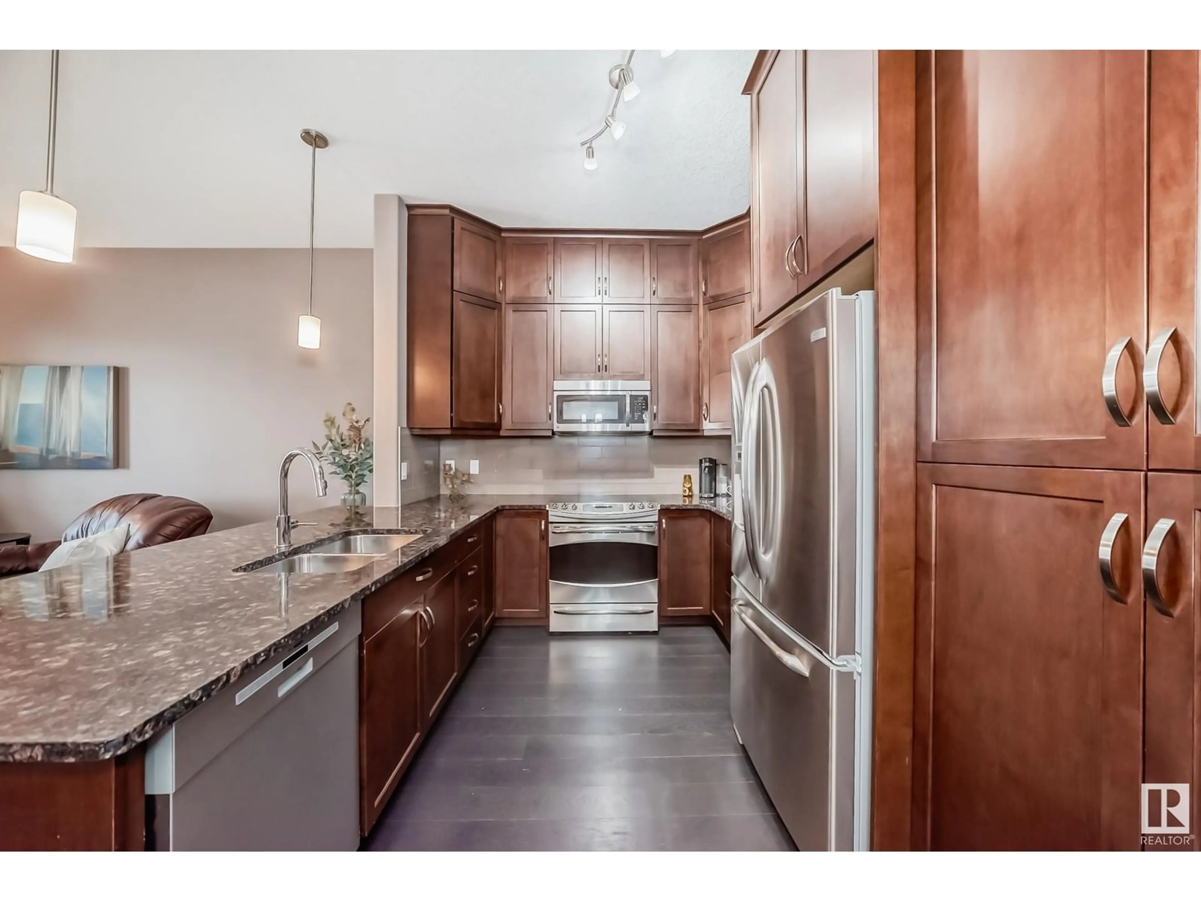 Open concept kitchen, unknown for #434 - 6079 MAYNARD WY, Edmonton Alberta T6R0S4