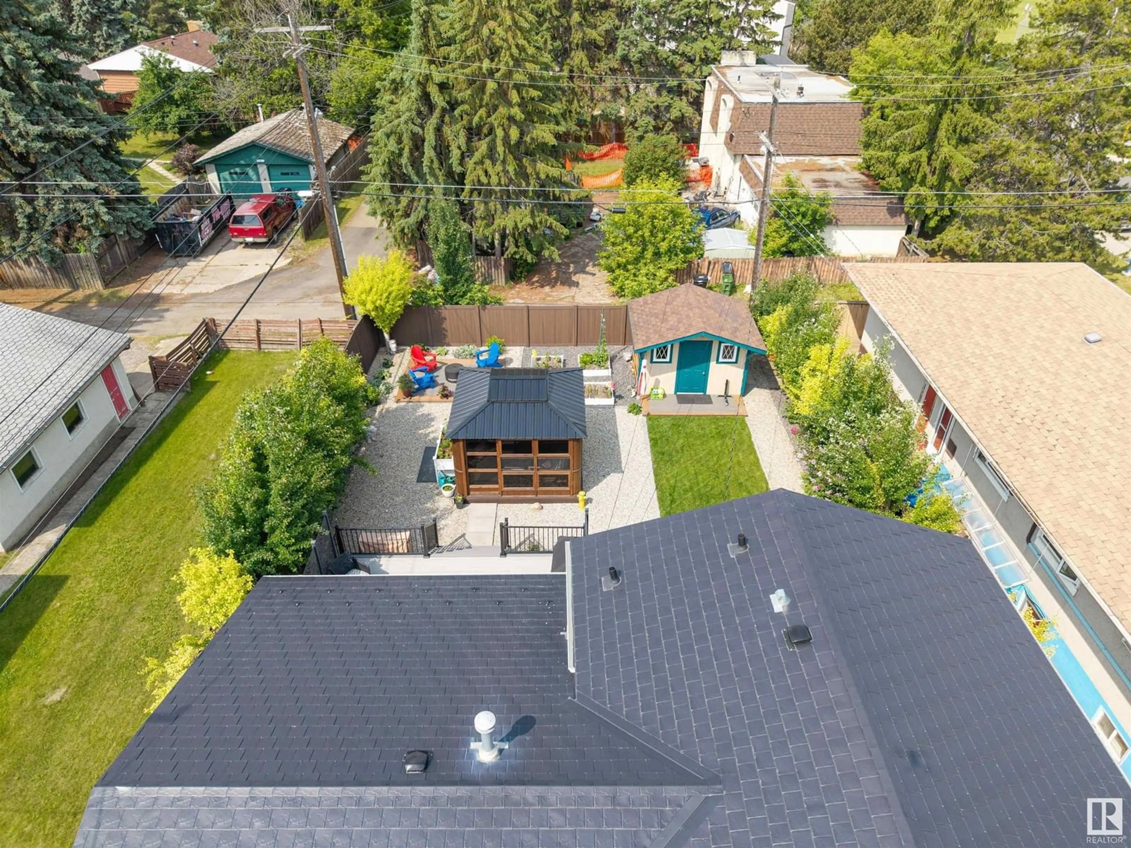 A pic from outside/outdoor area/front of a property/back of a property/a pic from drone, street for 9046 142 ST, Edmonton Alberta T5R0M5