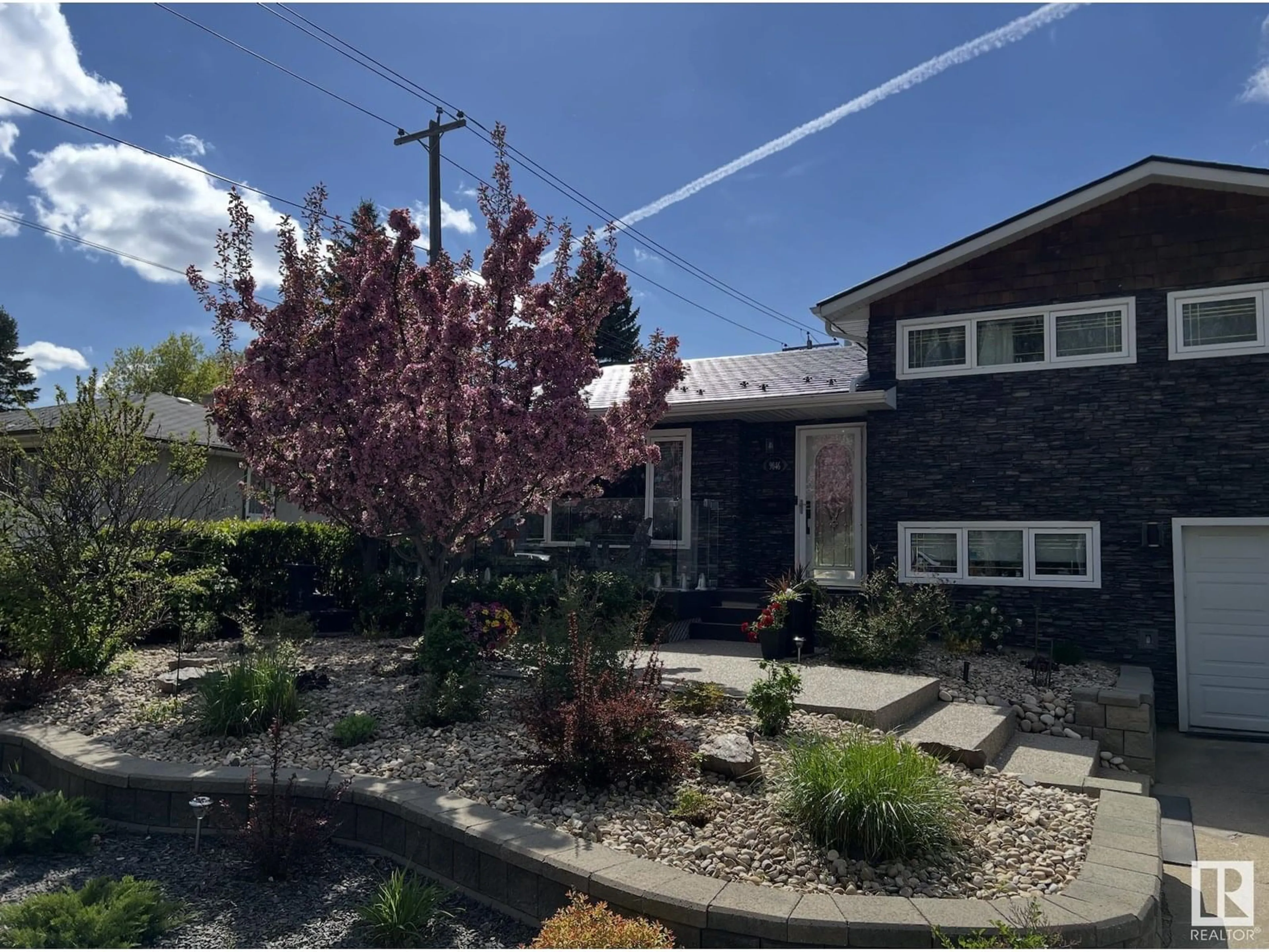 A pic from outside/outdoor area/front of a property/back of a property/a pic from drone, street for 9046 142 ST, Edmonton Alberta T5R0M5