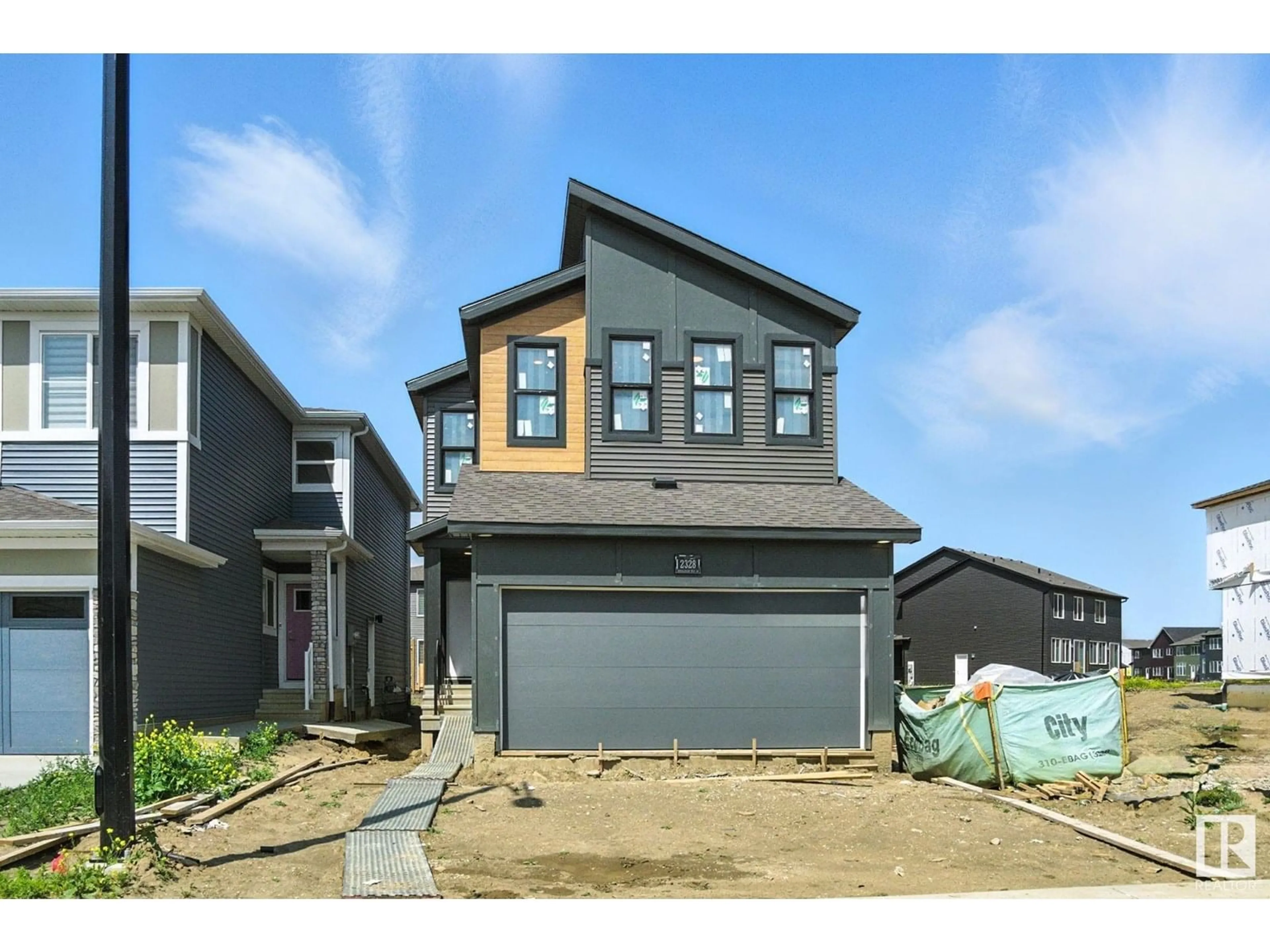 Home with vinyl exterior material, street for SW SW - 2328 MUCKLEPLUM WY, Edmonton Alberta T6X3J9