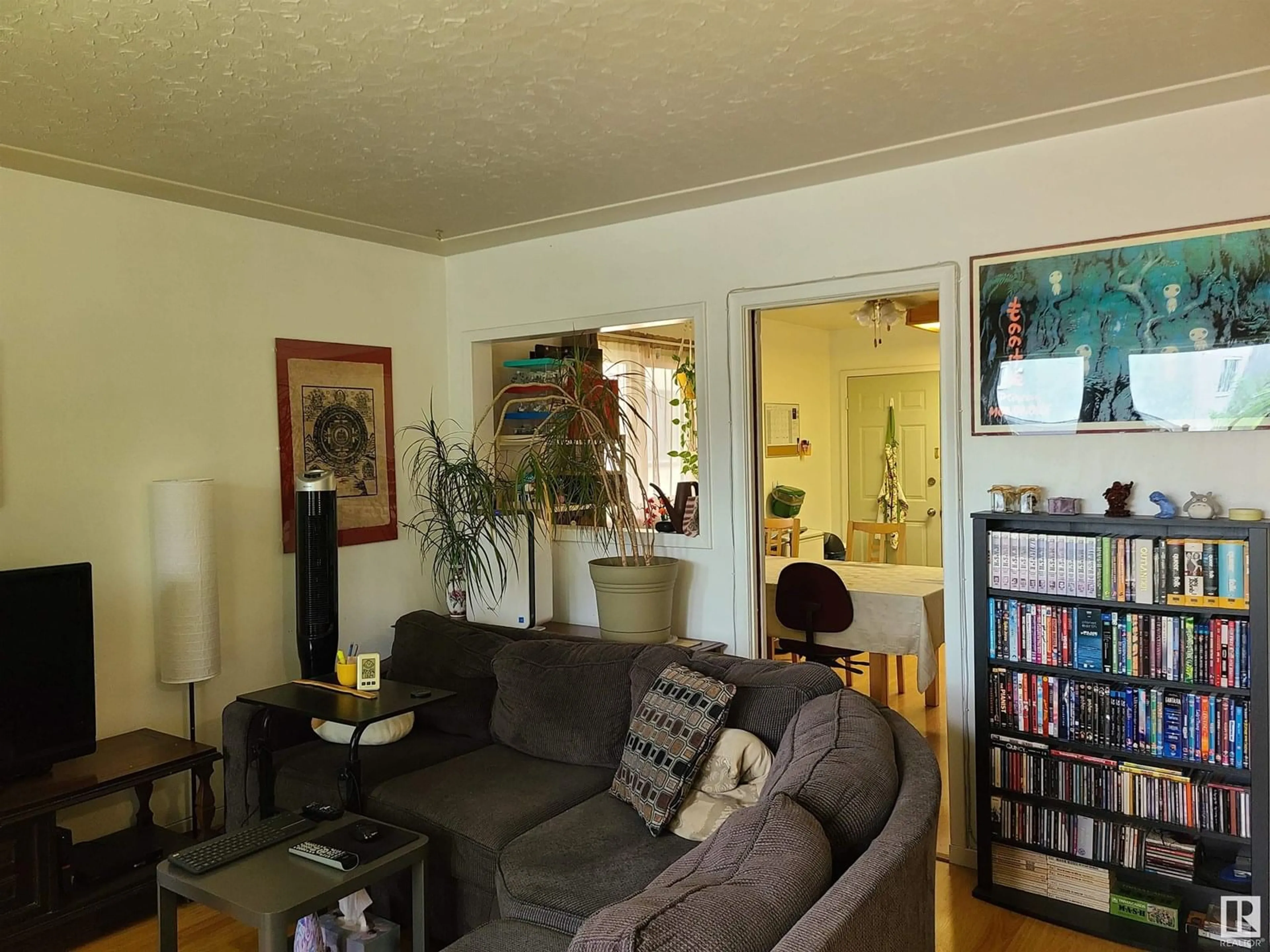 Living room with furniture, unknown for 10115 83 AV, Edmonton Alberta T6E2C5