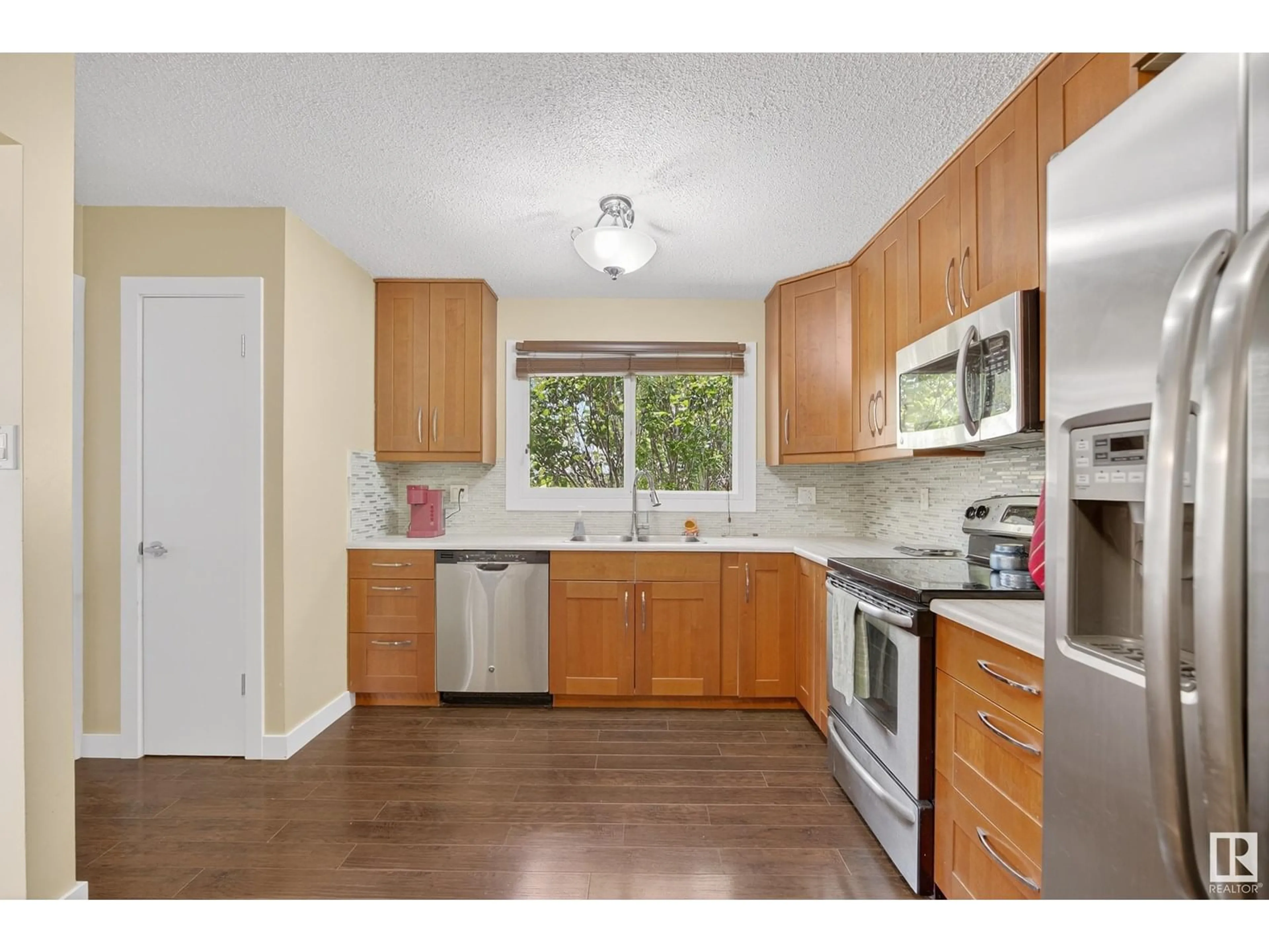 Standard kitchen, wood/laminate floor for 14228 79 ST, Edmonton Alberta T5C1K3